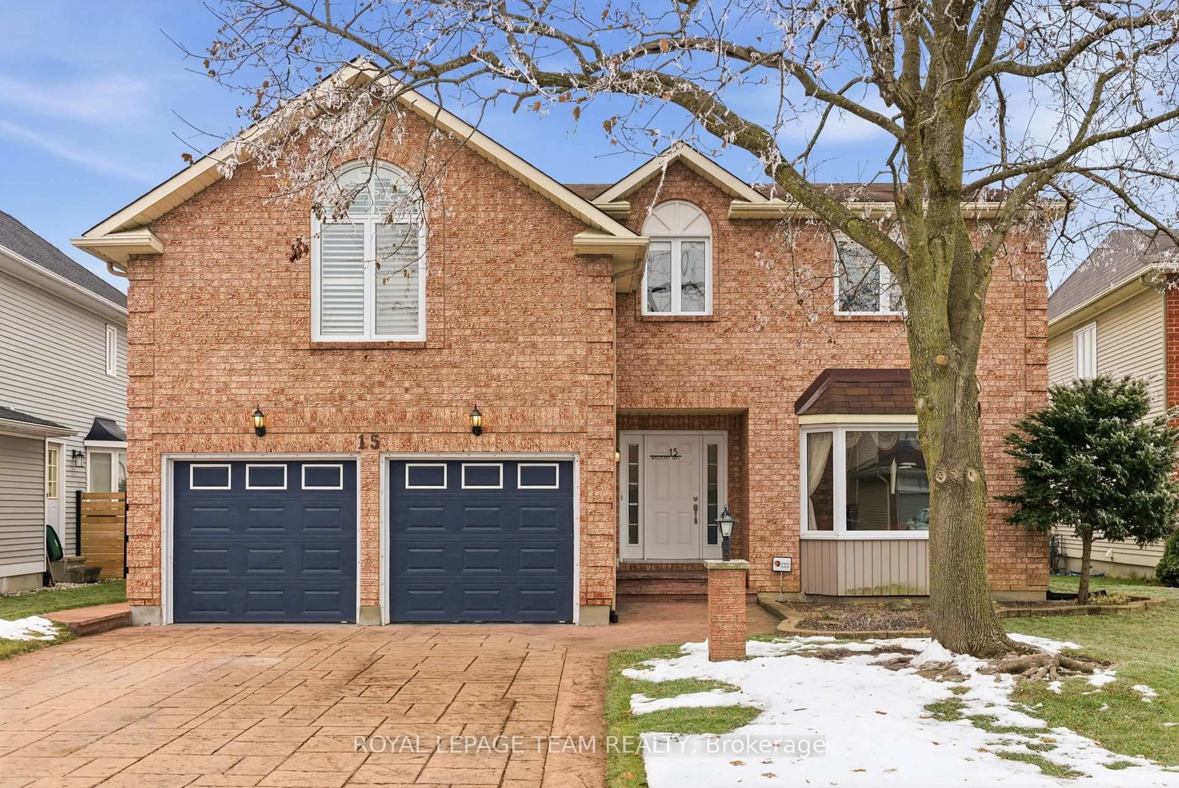 Home with brick exterior material, street for 15 Wellfleet Cres, Barrhaven Ontario K2J 2Y3