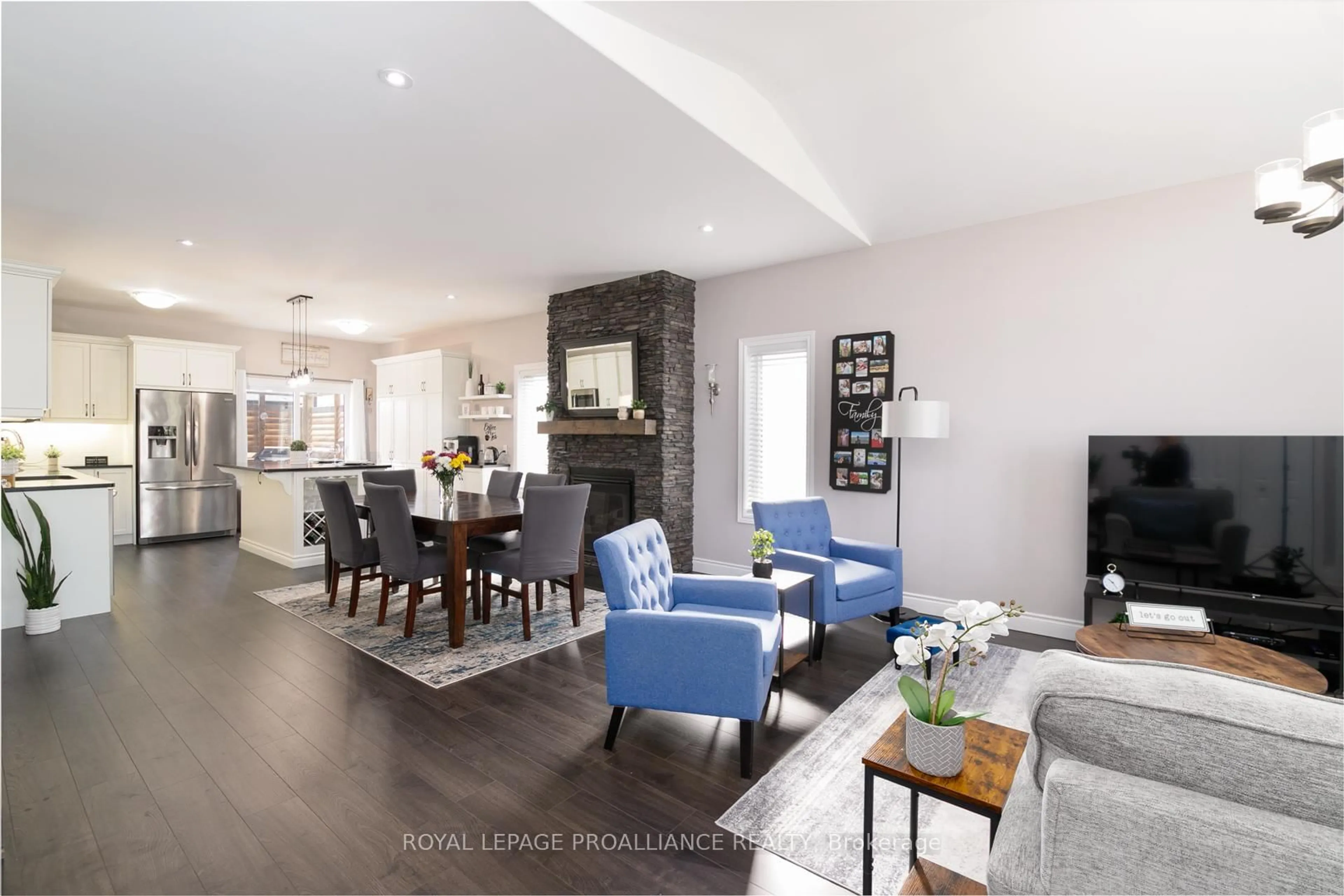 Living room with furniture, wood/laminate floor for 81 Sienna Ave, Belleville Ontario K8P 0E9