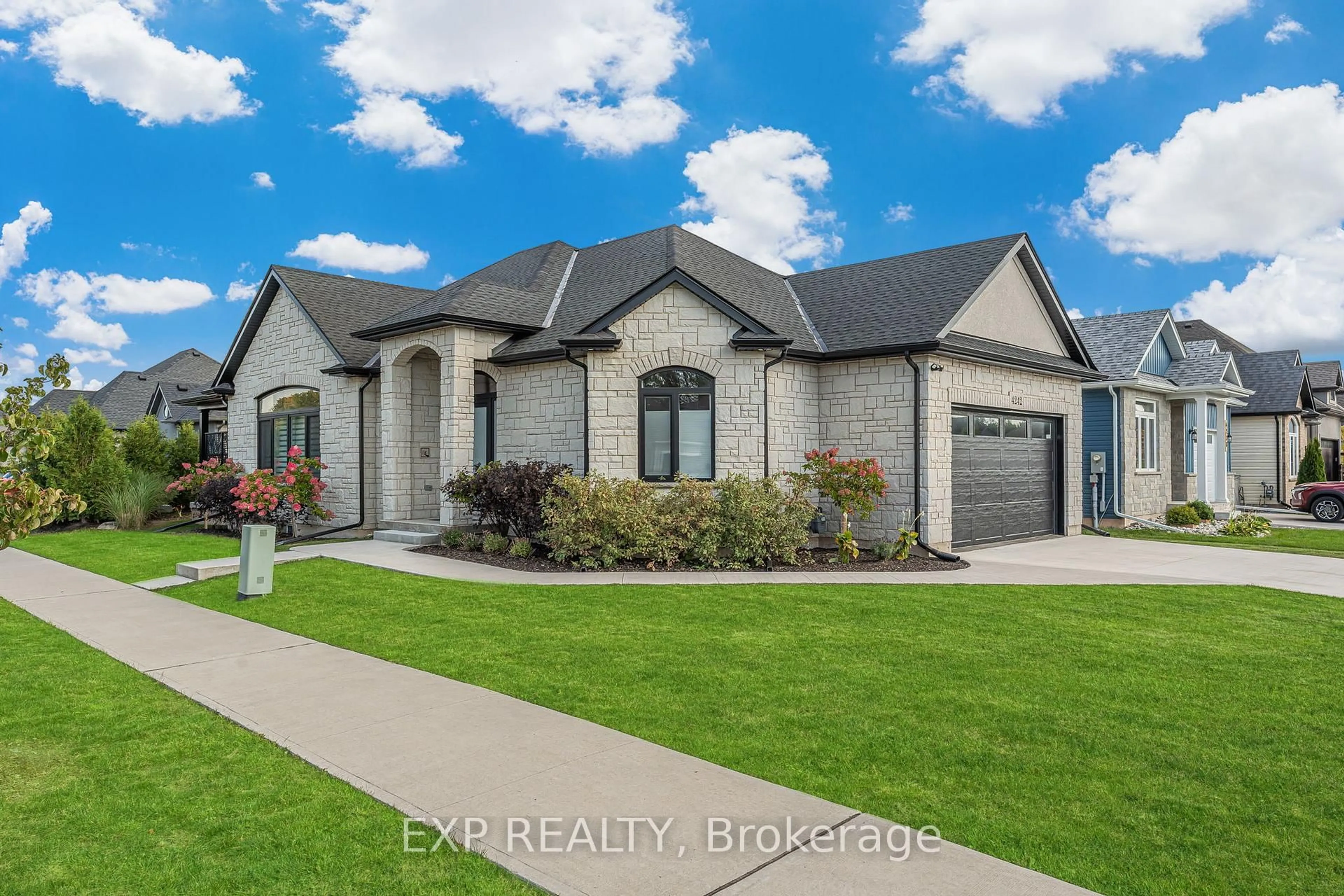 Home with brick exterior material, street for 4242 Village Creek Dr, Fort Erie Ontario L0S 1S0
