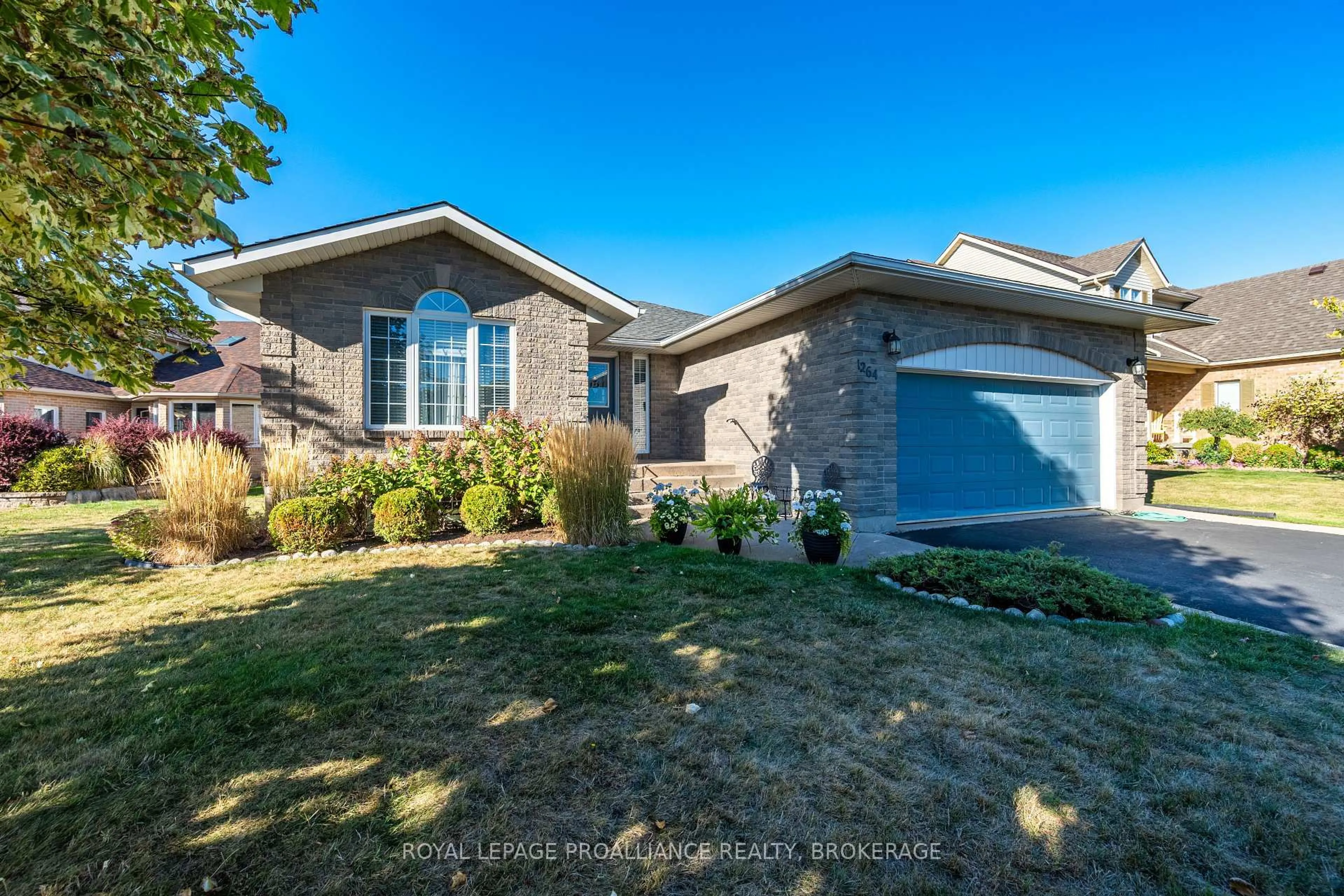 Home with brick exterior material, street for 1264 Historic Way, Kingston Ontario K7P 2T7