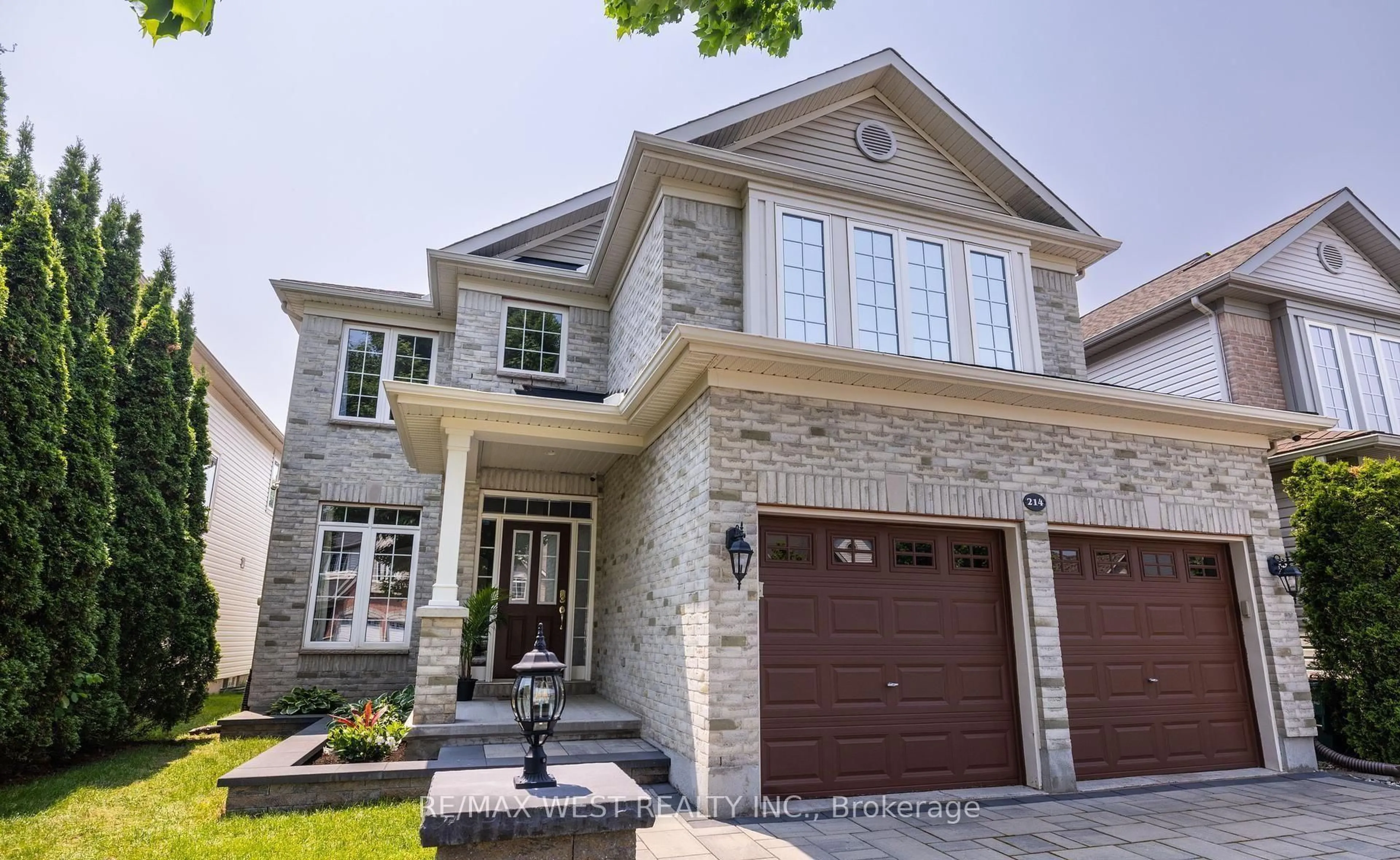 Home with brick exterior material, street for 214 Castlegarth Cres, Ottawa Ontario K2J 5N6