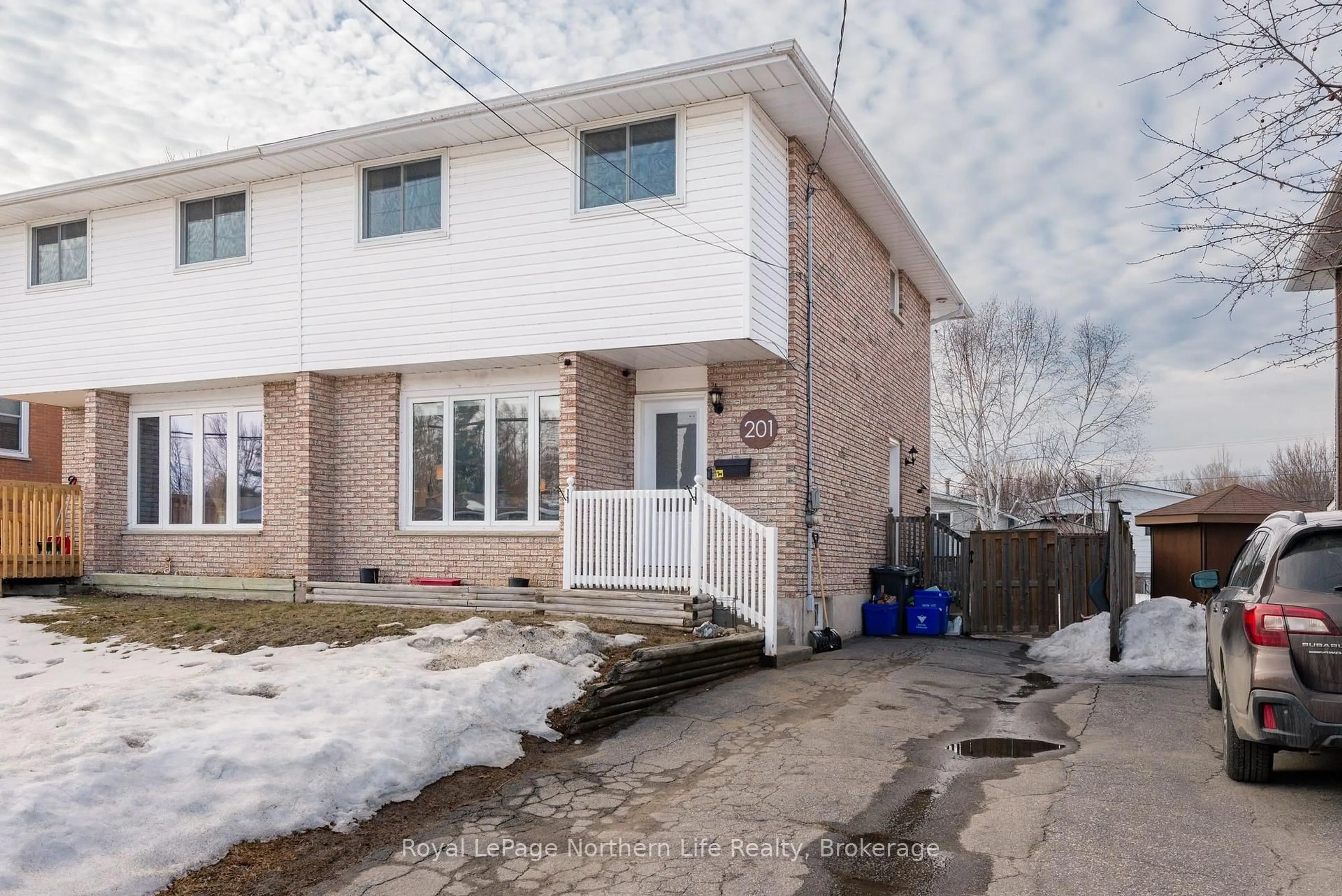 A pic from outside/outdoor area/front of a property/back of a property/a pic from drone, street for 201 MARSHALL PARK Dr, North Bay Ontario P1A 3L1