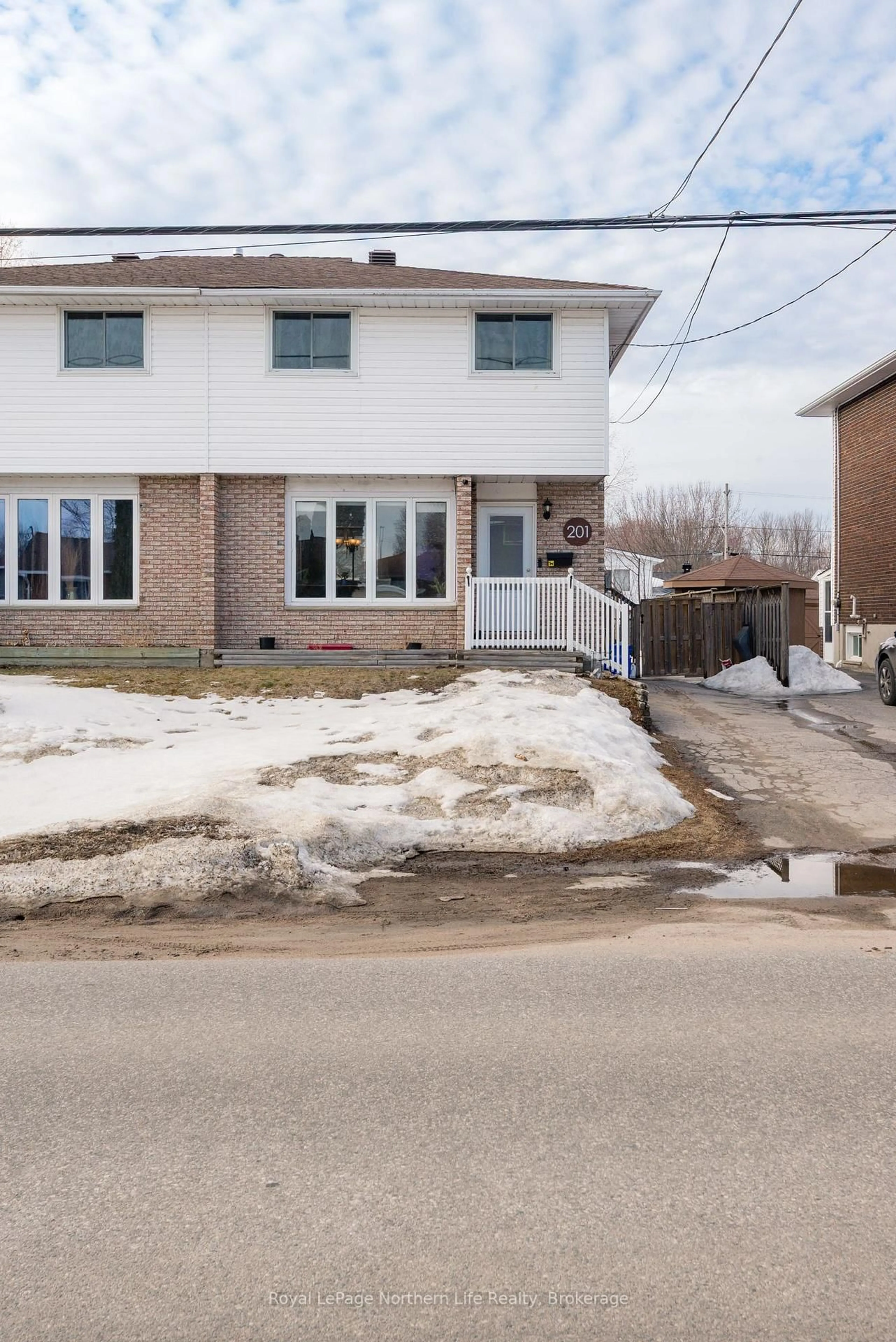 A pic from outside/outdoor area/front of a property/back of a property/a pic from drone, street for 201 MARSHALL PARK Dr, North Bay Ontario P1A 3L1