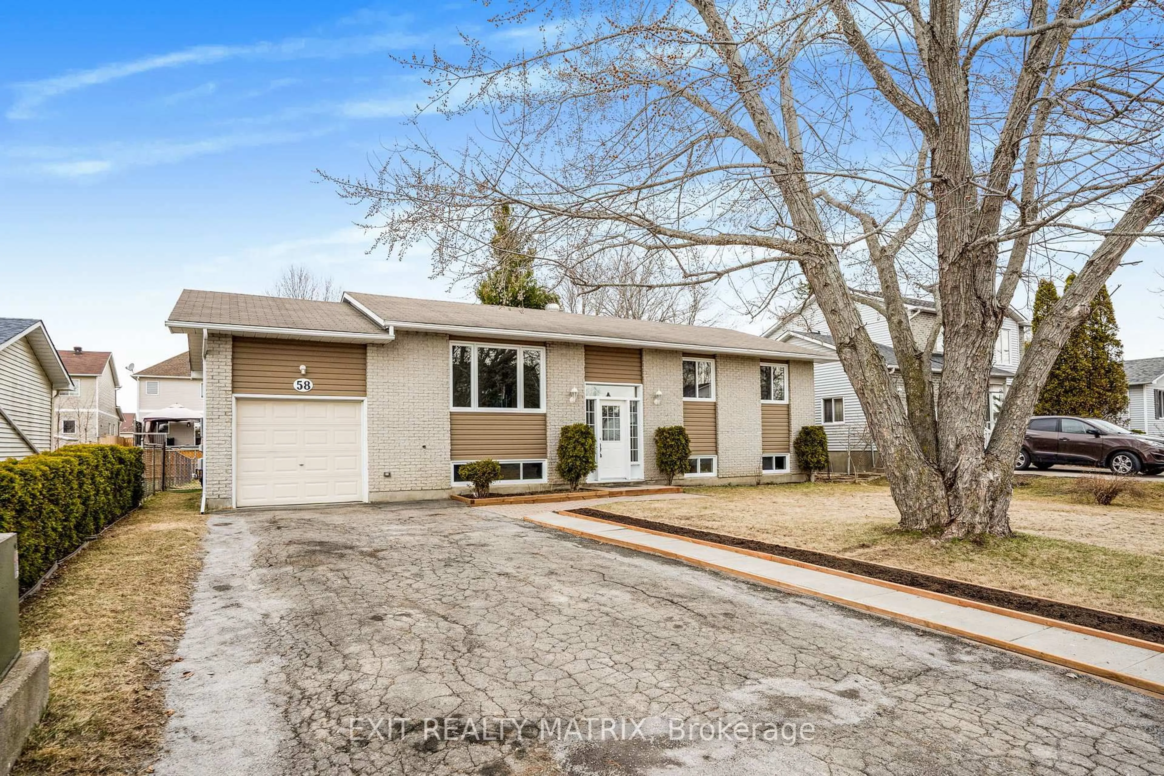 Home with vinyl exterior material, street for 58 Castlebeau St, Russell Ontario K0A 1W0