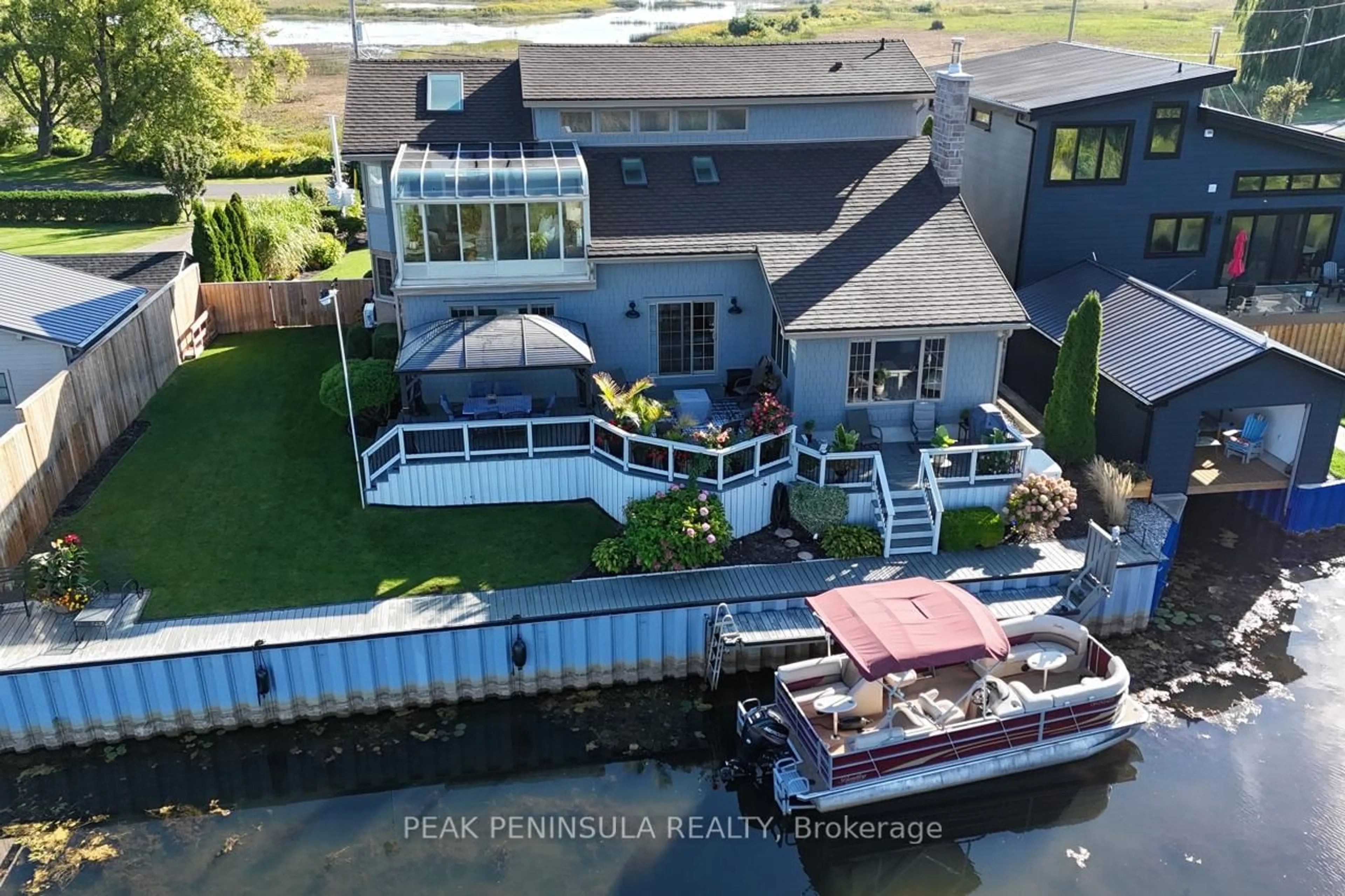 A pic from outside/outdoor area/front of a property/back of a property/a pic from drone, water/lake/river/ocean view for 86 Old Cut Blvd, Norfolk Ontario N0E 1M0