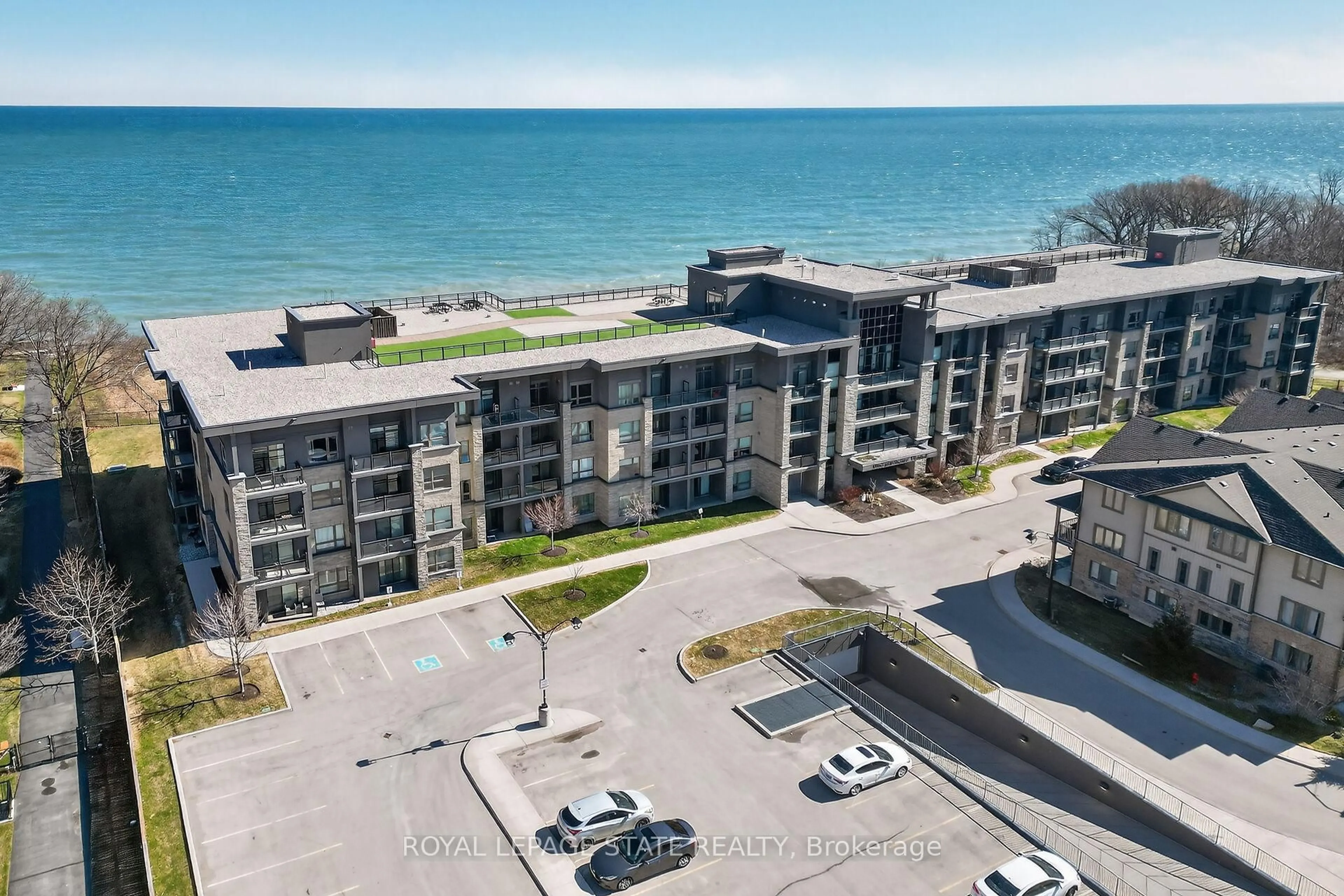 A pic from outside/outdoor area/front of a property/back of a property/a pic from drone, water/lake/river/ocean view for 35 Southshore Cres #327, Hamilton Ontario L8E 0J2