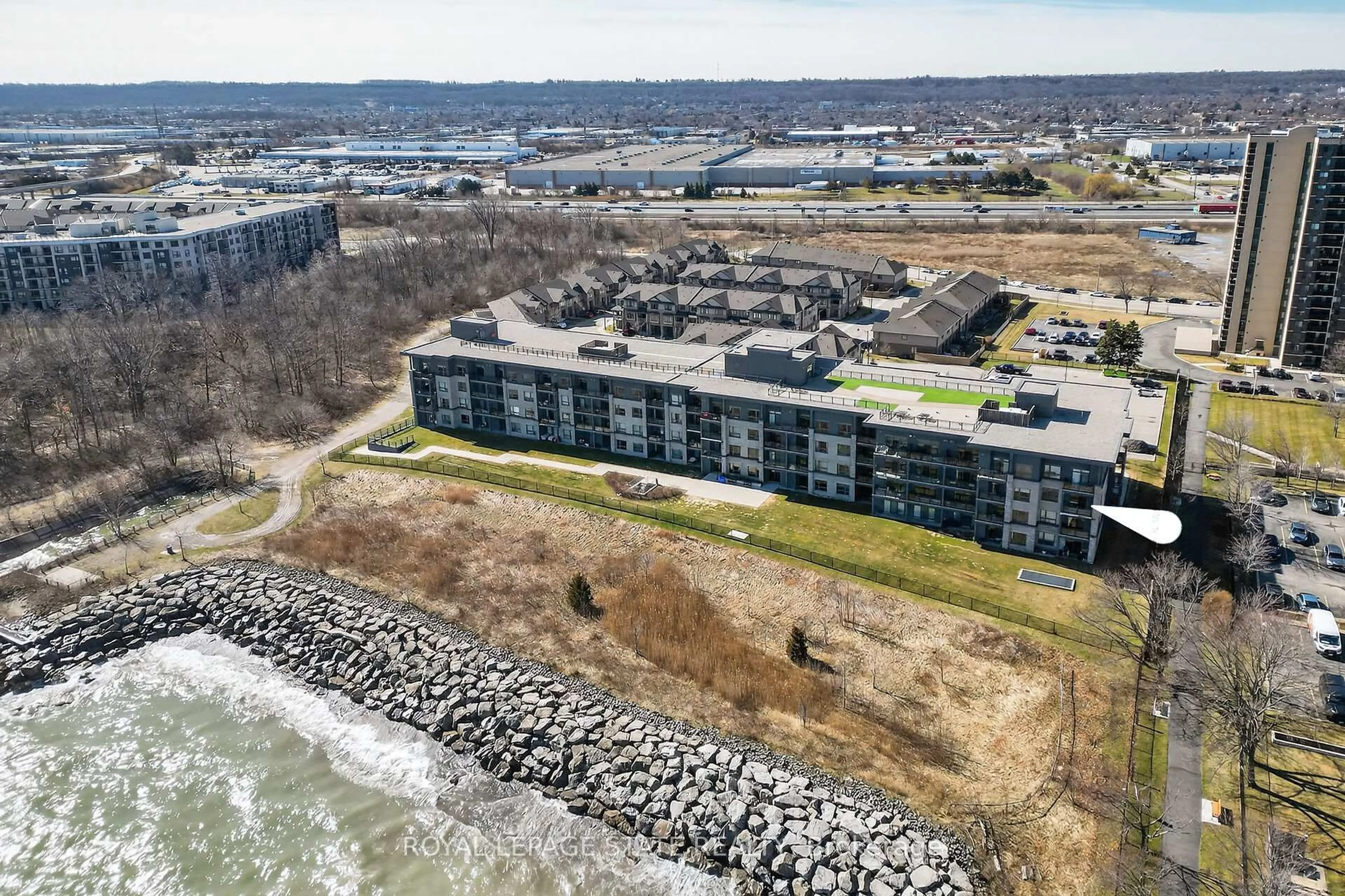 A pic from outside/outdoor area/front of a property/back of a property/a pic from drone, water/lake/river/ocean view for 35 Southshore Cres #327, Hamilton Ontario L8E 0J2