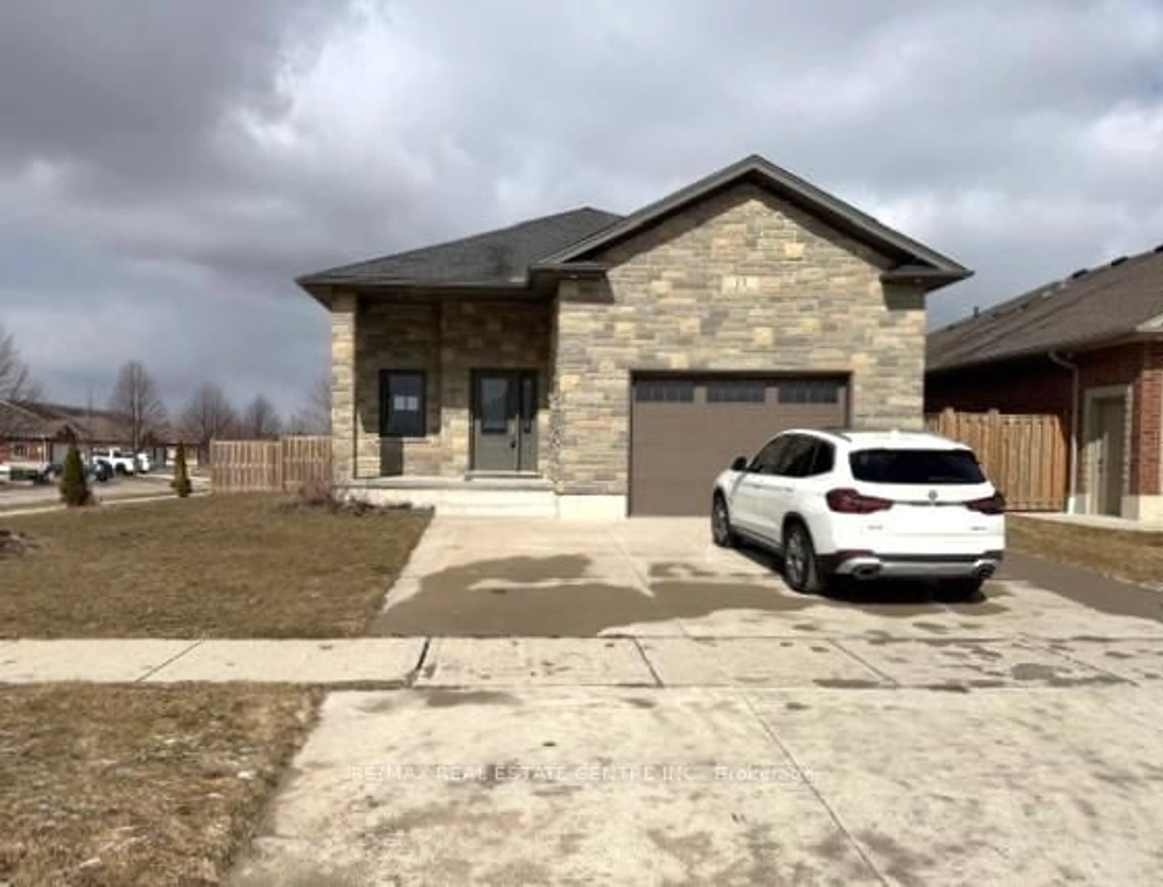 Home with brick exterior material, street for 13 FORBES Cres, North Perth Ontario N4W 0B3