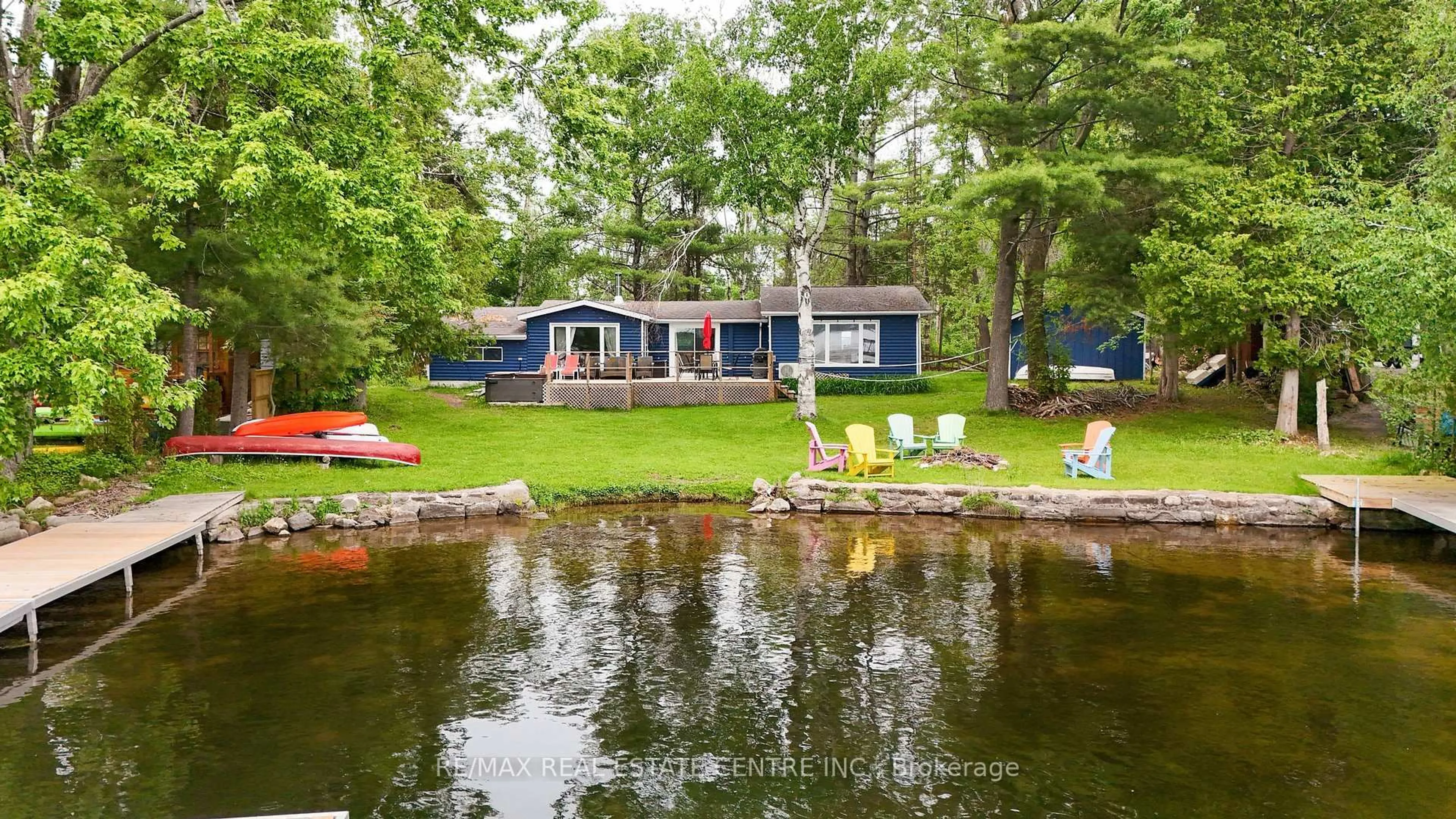 A pic from outside/outdoor area/front of a property/back of a property/a pic from drone, water/lake/river/ocean view for 3012 Greenwood Lane, Selwyn Ontario K0L 2H0