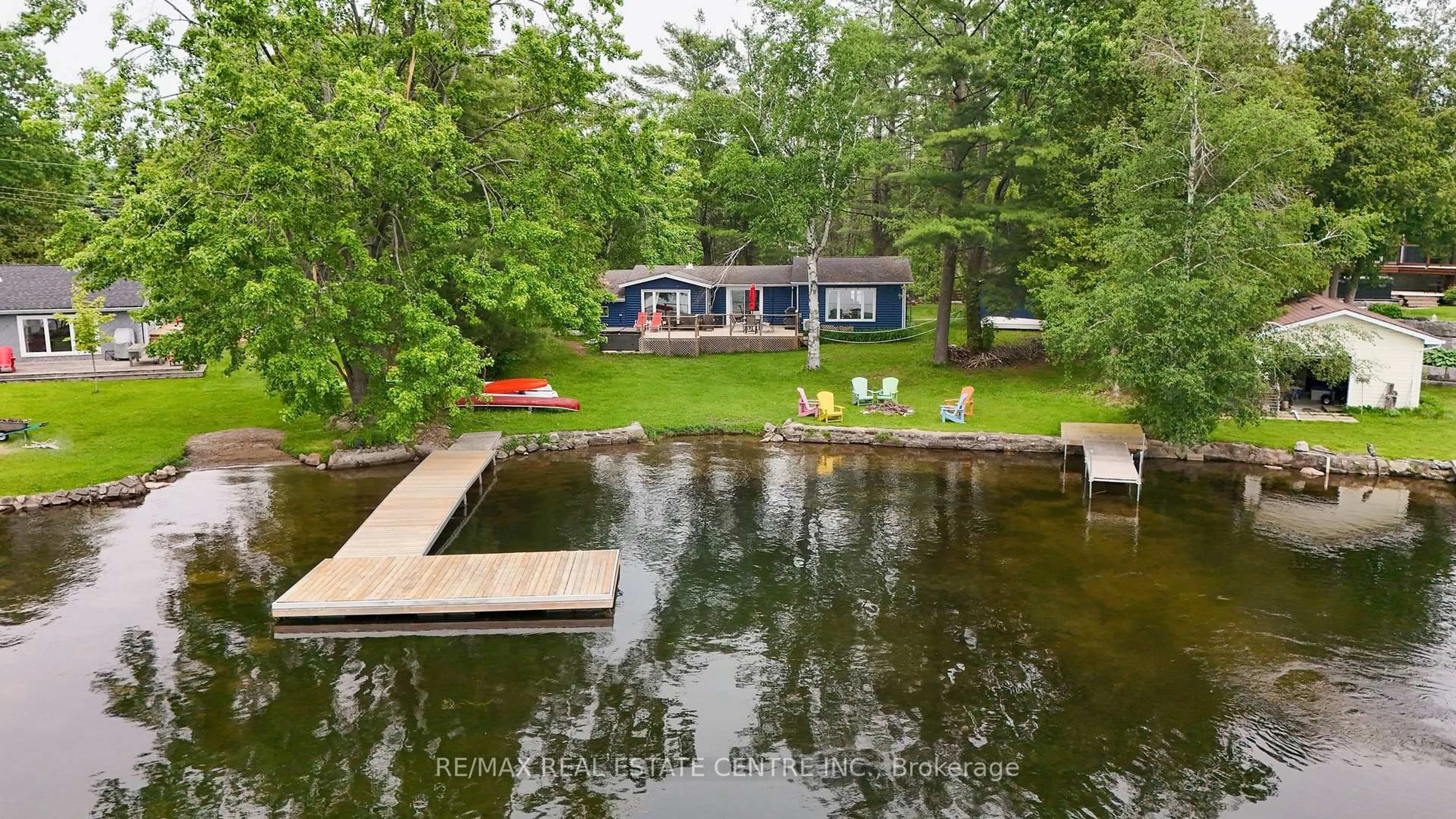 A pic from outside/outdoor area/front of a property/back of a property/a pic from drone, water/lake/river/ocean view for 3012 Greenwood Lane, Selwyn Ontario K0L 2H0
