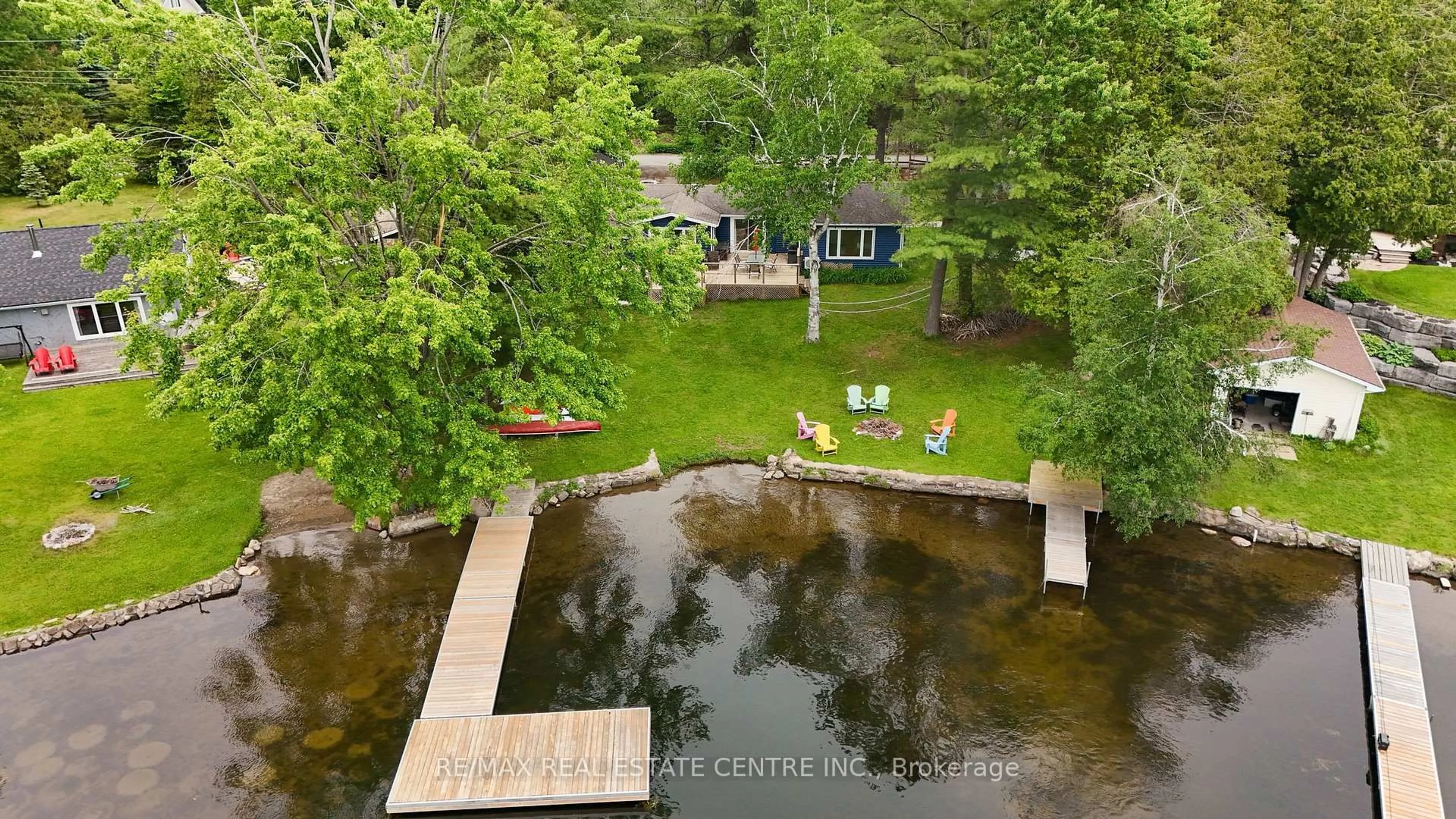A pic from outside/outdoor area/front of a property/back of a property/a pic from drone, water/lake/river/ocean view for 3012 Greenwood Lane, Selwyn Ontario K0L 2H0