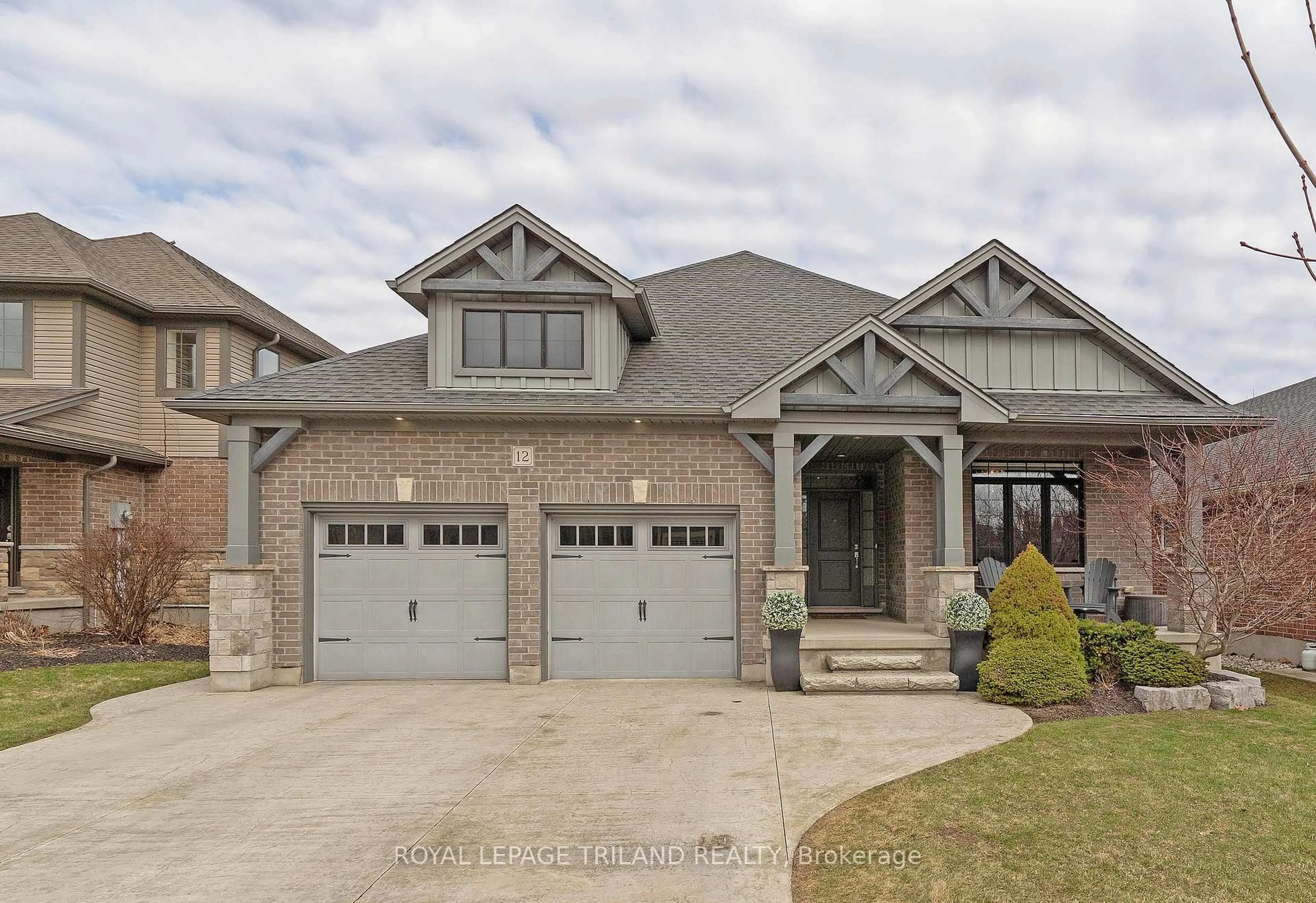 Home with brick exterior material, street for 12 Tanager Pl, St. Thomas Ontario N5R 6K9