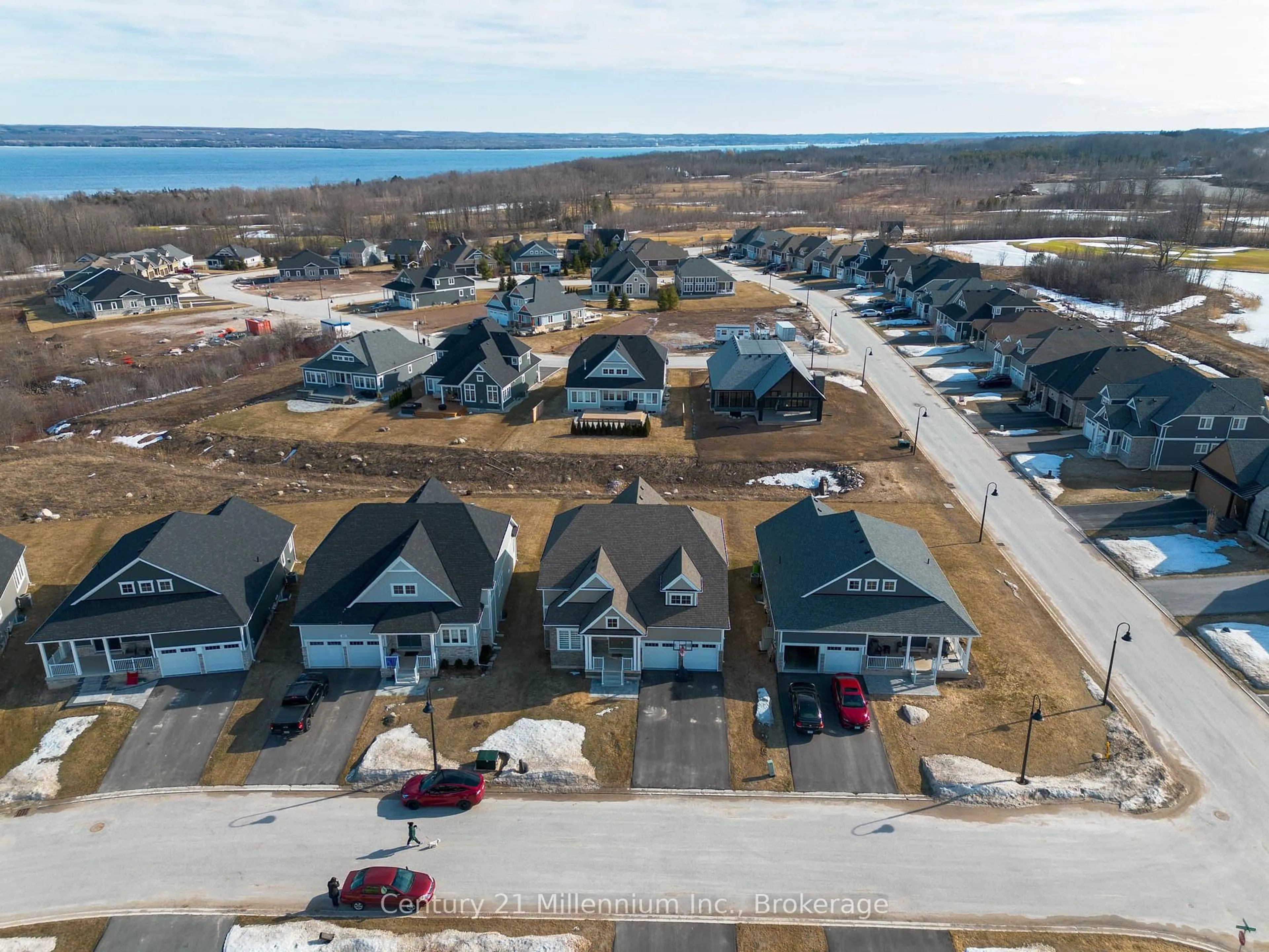 A pic from outside/outdoor area/front of a property/back of a property/a pic from drone, water/lake/river/ocean view for 103 Laurens Lane, Georgian Bluffs Ontario N0H 1S0