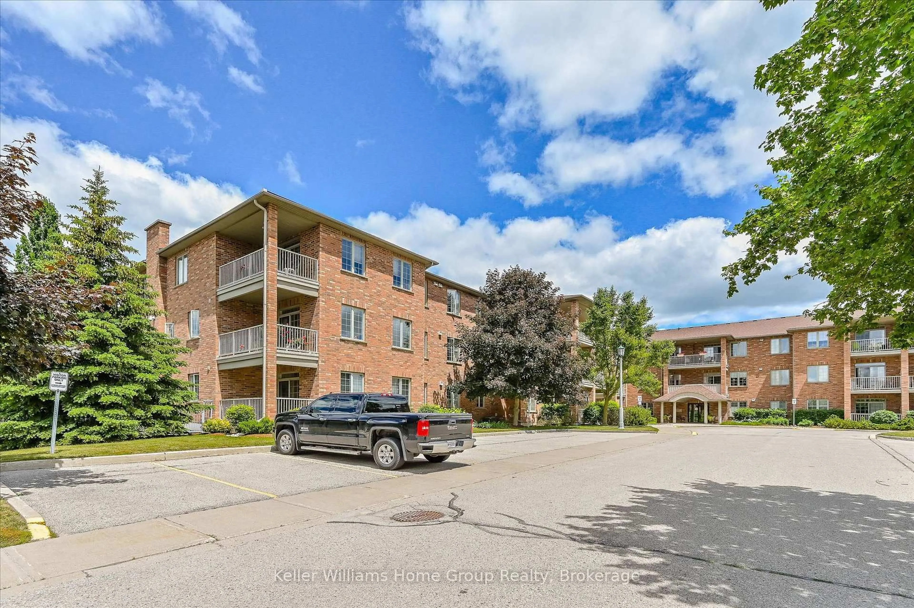 A pic from outside/outdoor area/front of a property/back of a property/a pic from drone, street for 20 Station Sq #104, Centre Wellington Ontario N0B 1S0