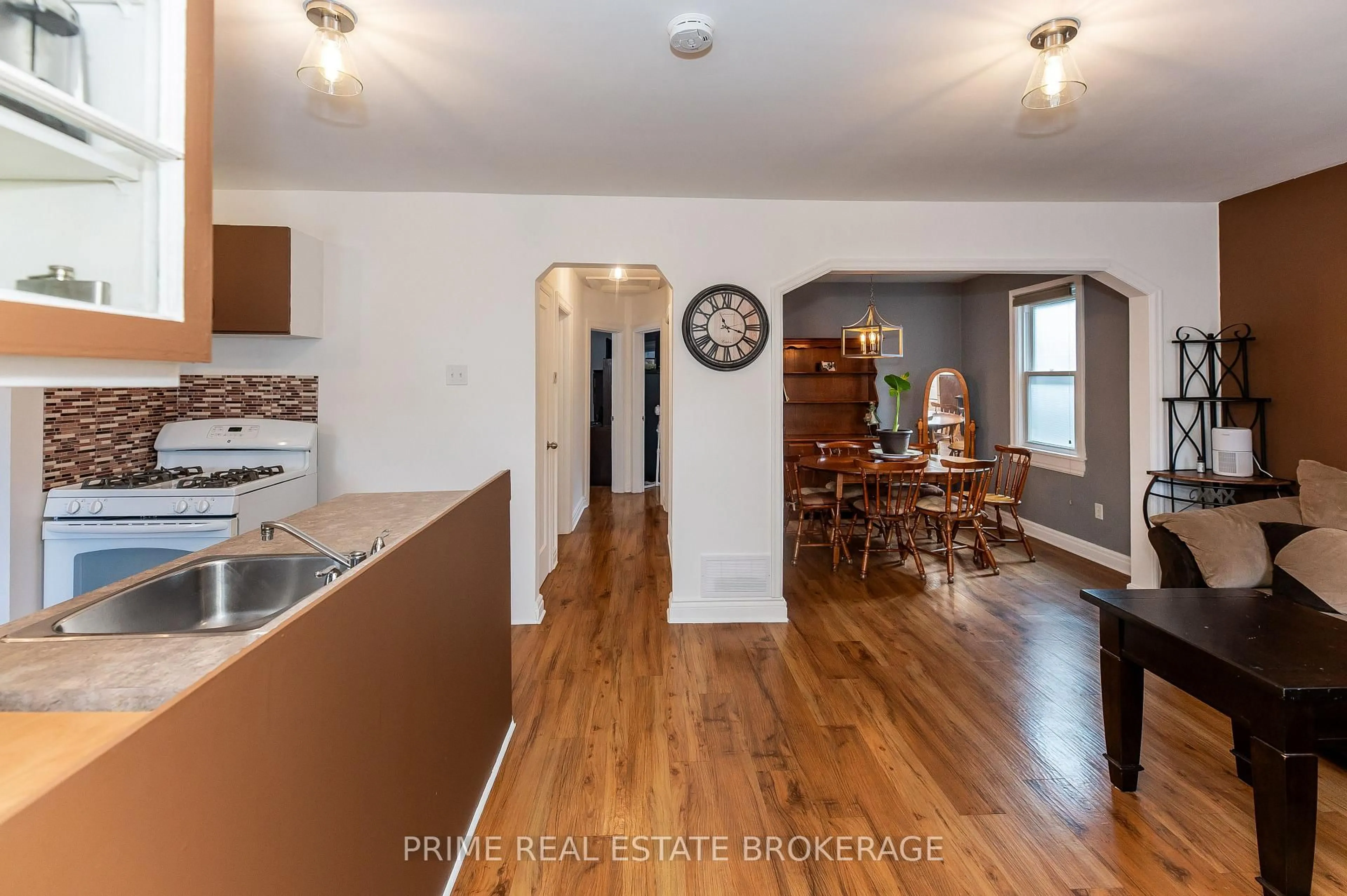 Open concept kitchen, wood/laminate floor for 130 Giles St, London East Ontario N5Z 2V7