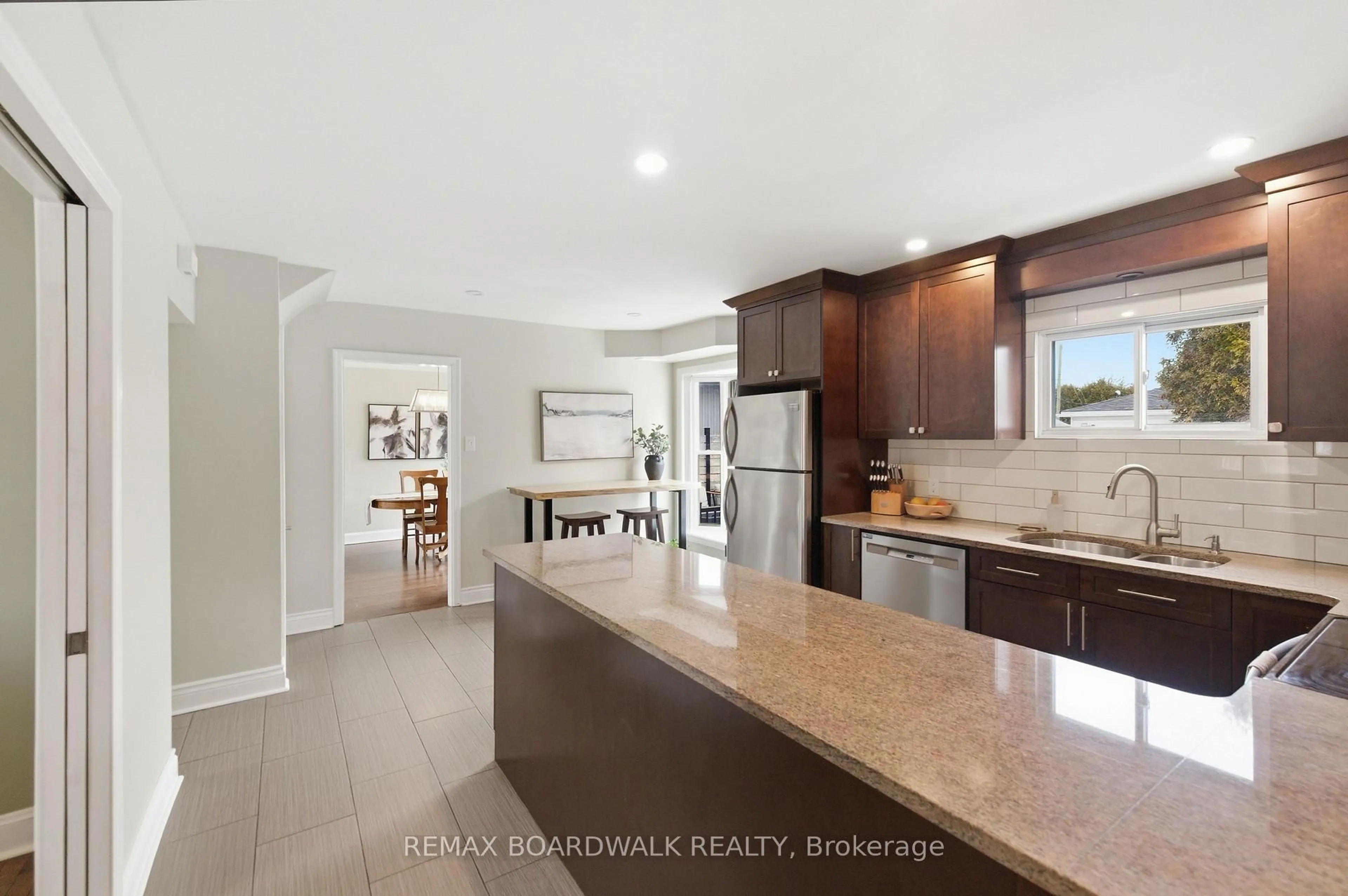 Open concept kitchen, ceramic/tile floor for 1250 Notting Hill Ave, Ottawa Ontario K1V 6T7