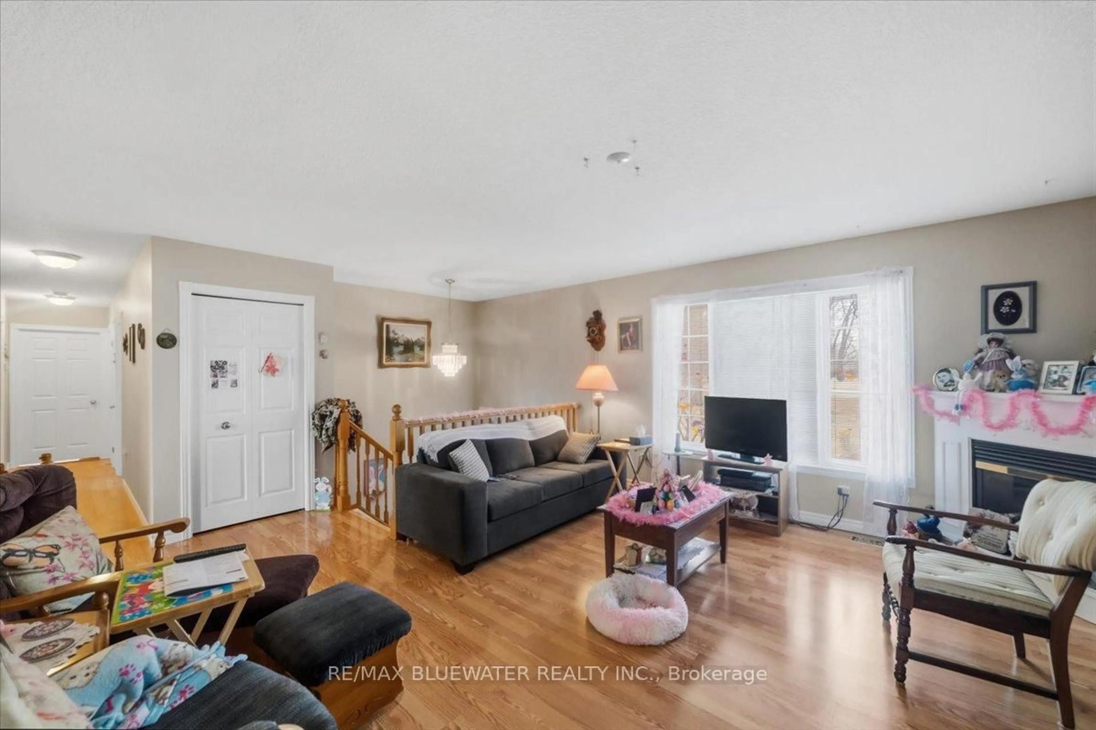 Living room with furniture, wood/laminate floor for 6704 Perth Line 44, West Perth Ontario N0K 1A0