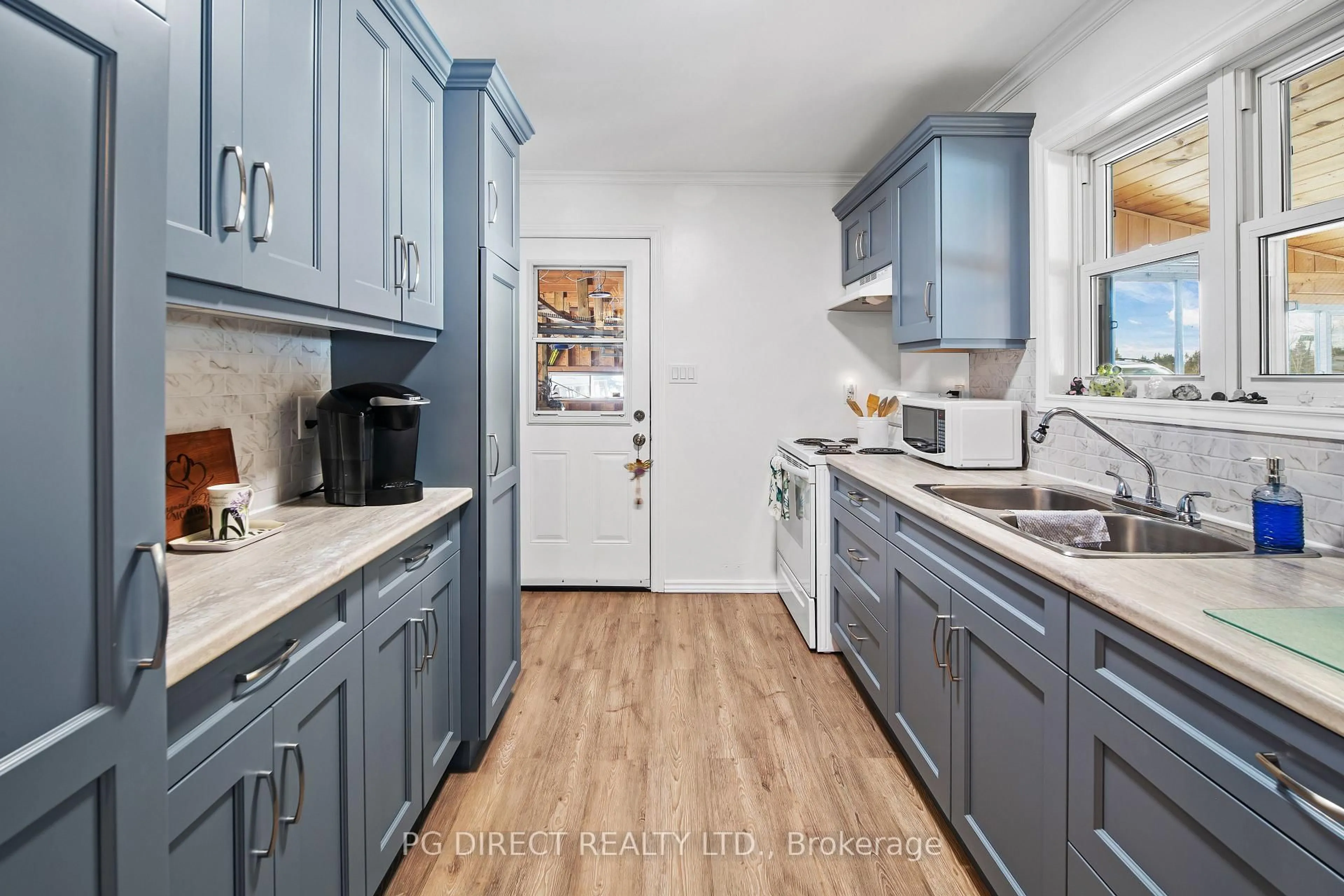 Open concept kitchen, ceramic/tile floor for 1 Wolfe Den St, Whitestone Ontario P0A 1G0