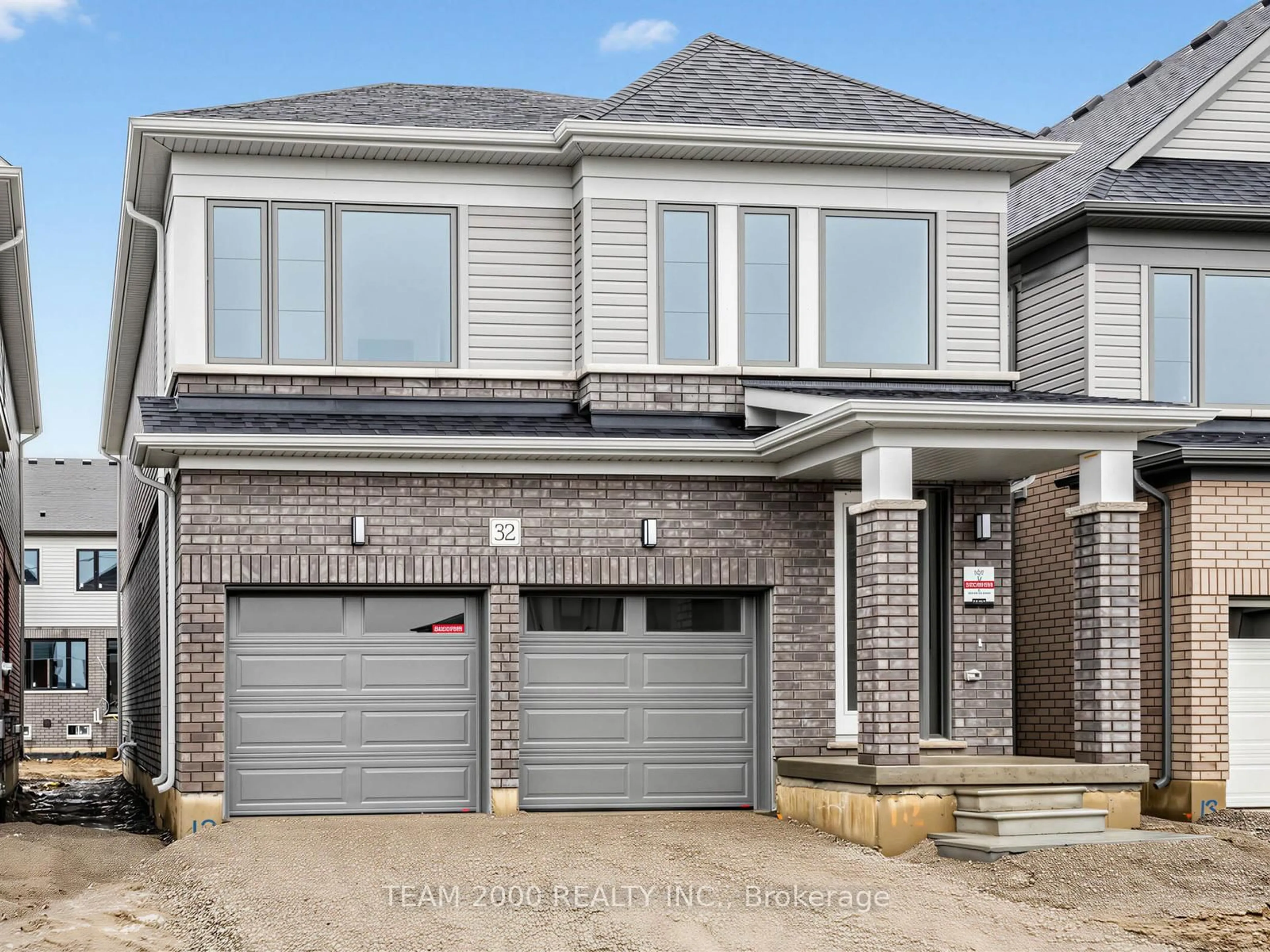 Home with brick exterior material, street for 32 Mayhew Lane, Hamilton Ontario L0R 1C0