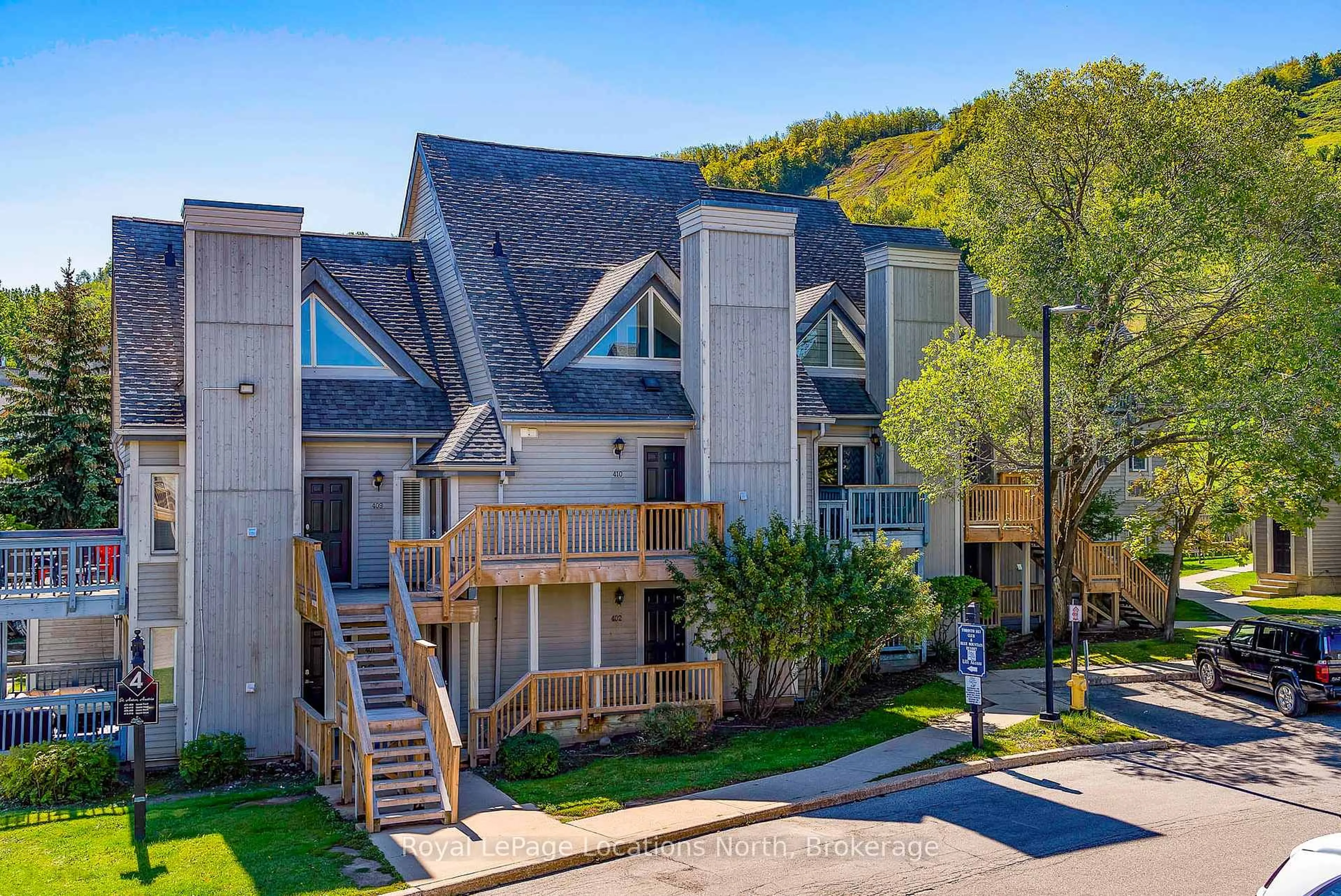 A pic from outside/outdoor area/front of a property/back of a property/a pic from drone, mountain view for 796468 19 GREY Rd #410, Blue Mountains Ontario L9Y 0N6