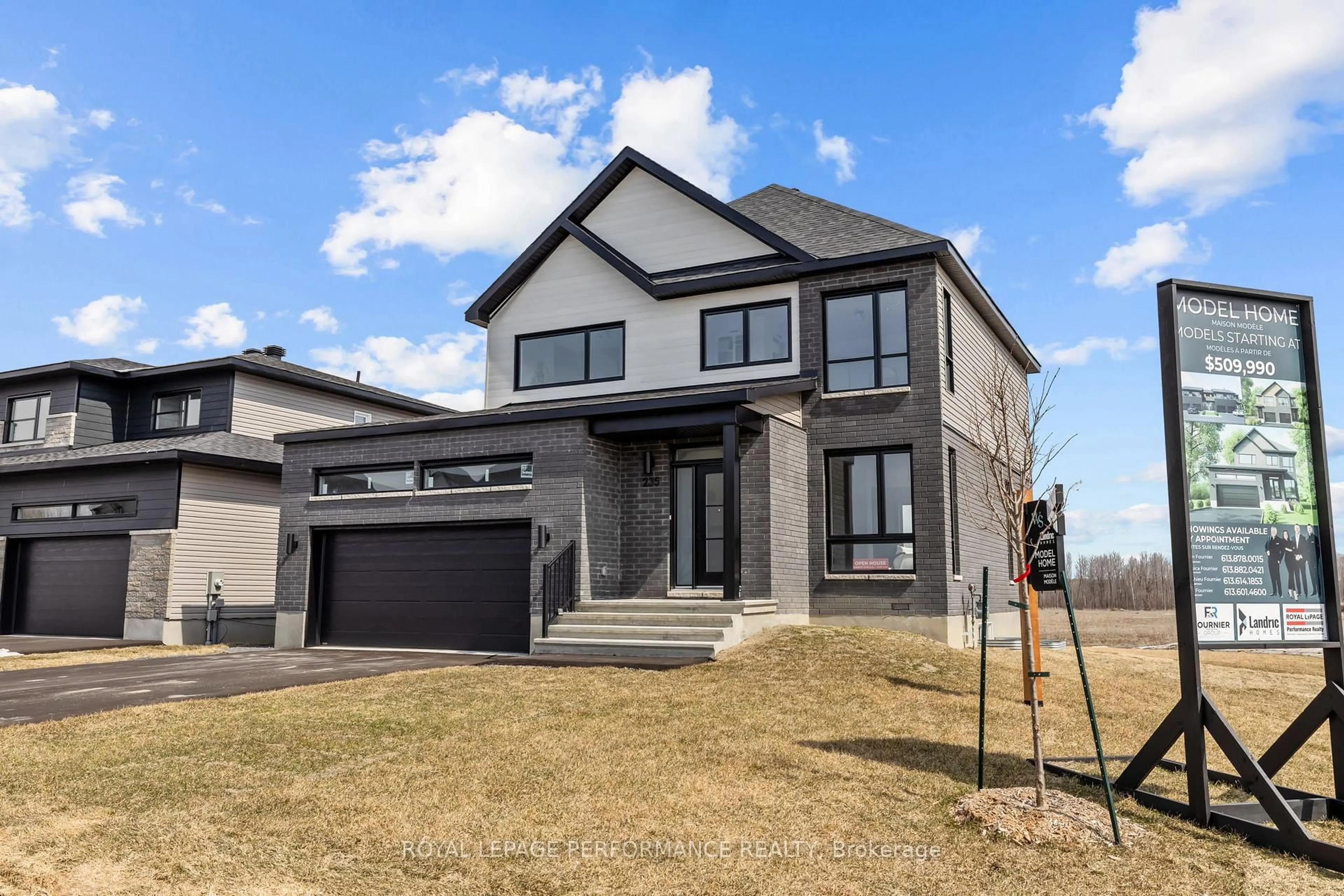 Home with vinyl exterior material, street for 235 Bourdeau Blvd, The Nation Ontario K0A 2M0