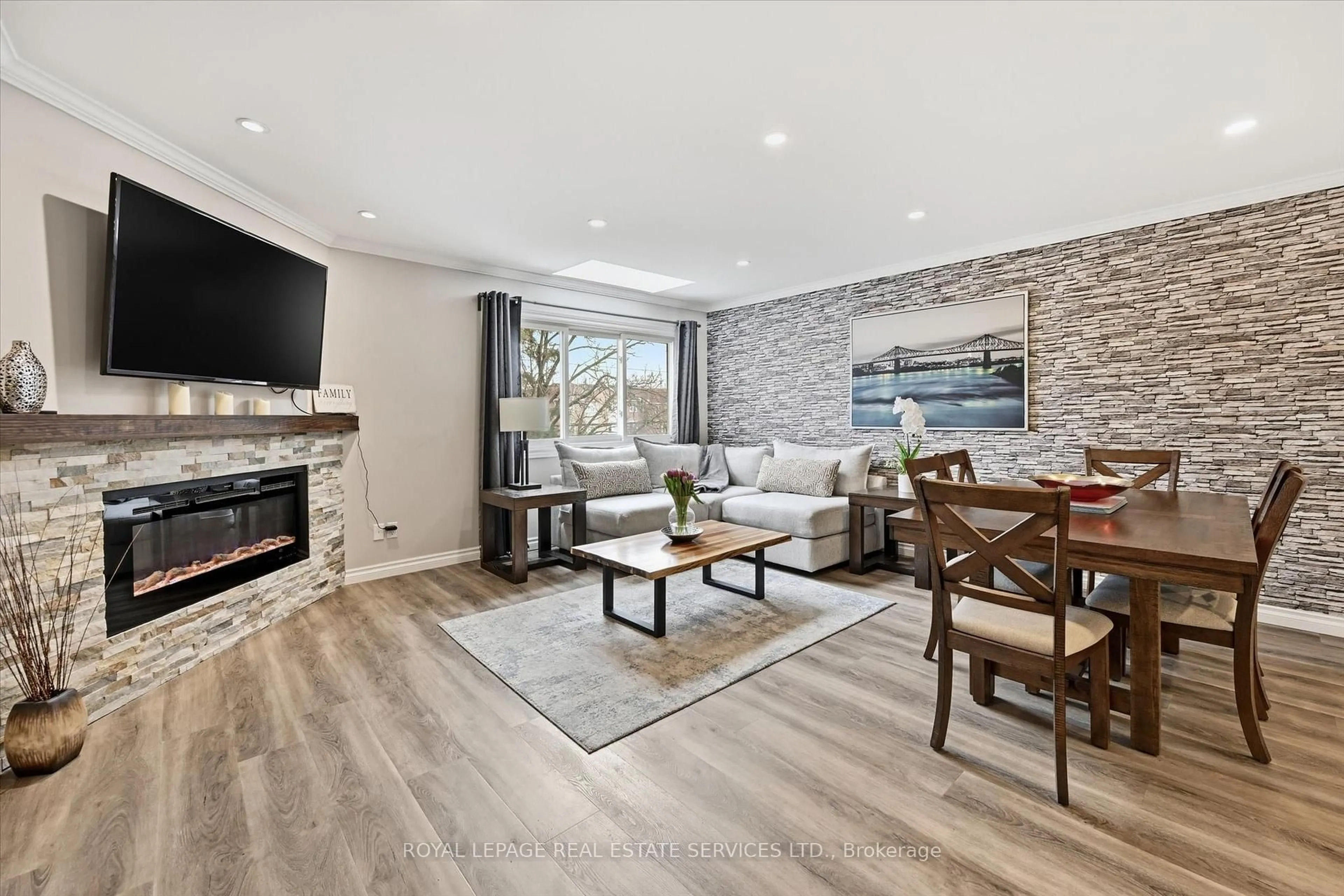 Living room with furniture, unknown for 26 Moss Blvd #51, Hamilton Ontario L9H 6W8