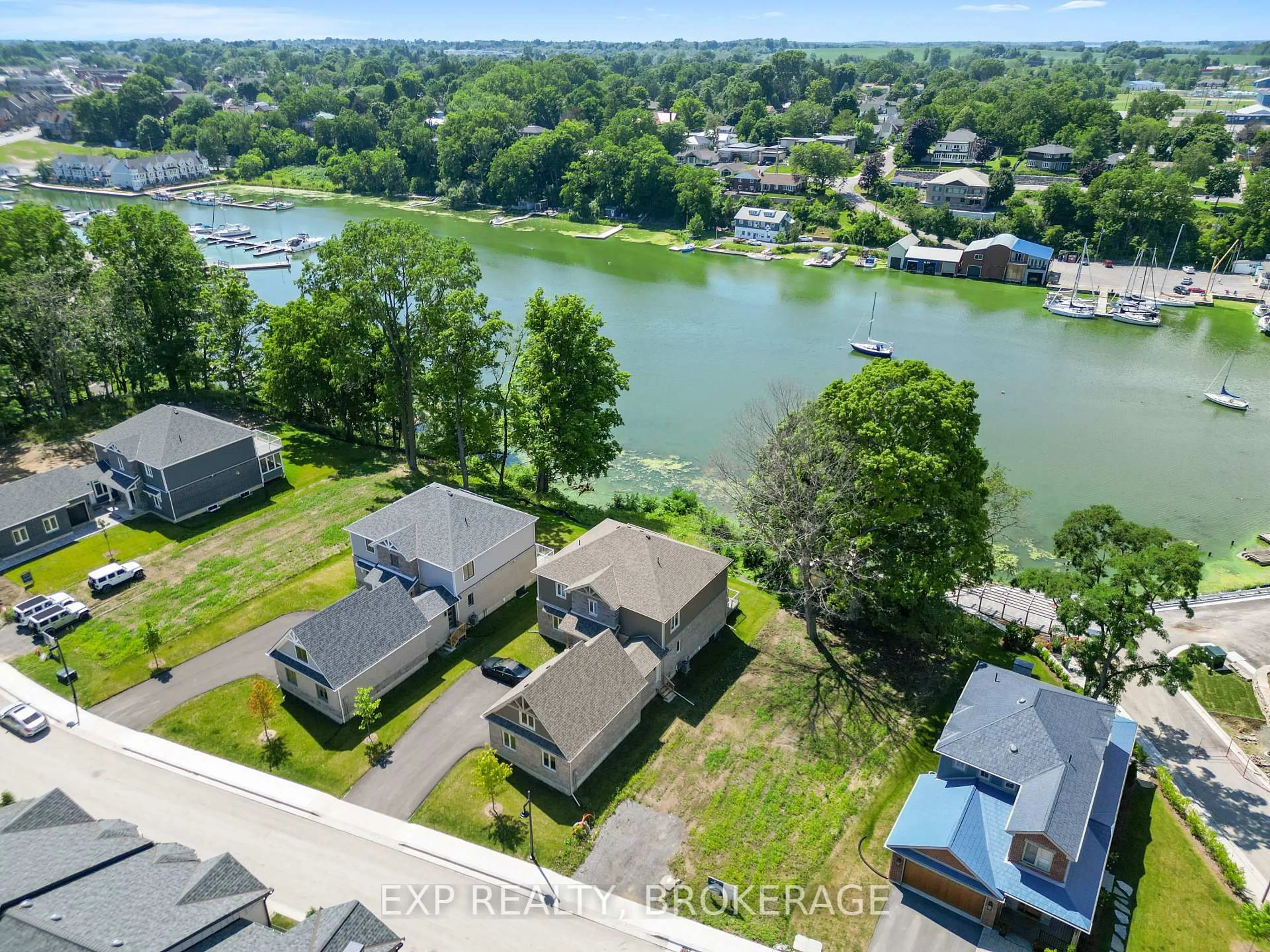 A pic from outside/outdoor area/front of a property/back of a property/a pic from drone, water/lake/river/ocean view for 101 VILLENEUVE Dr, Prince Edward County Ontario K0K 2T0