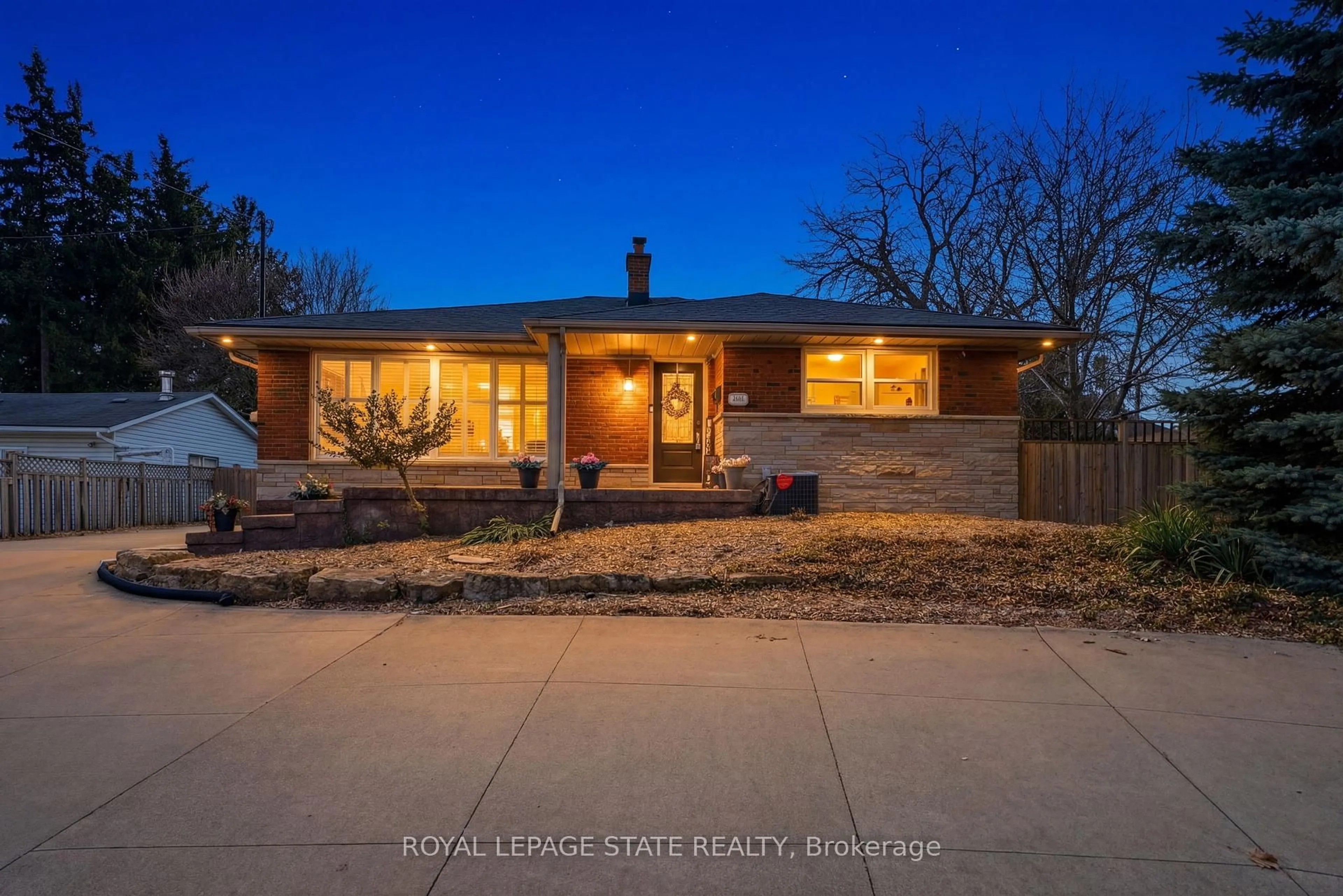 Home with brick exterior material, street for 473 Mohawk Rd, Hamilton Ontario L9C 1X3