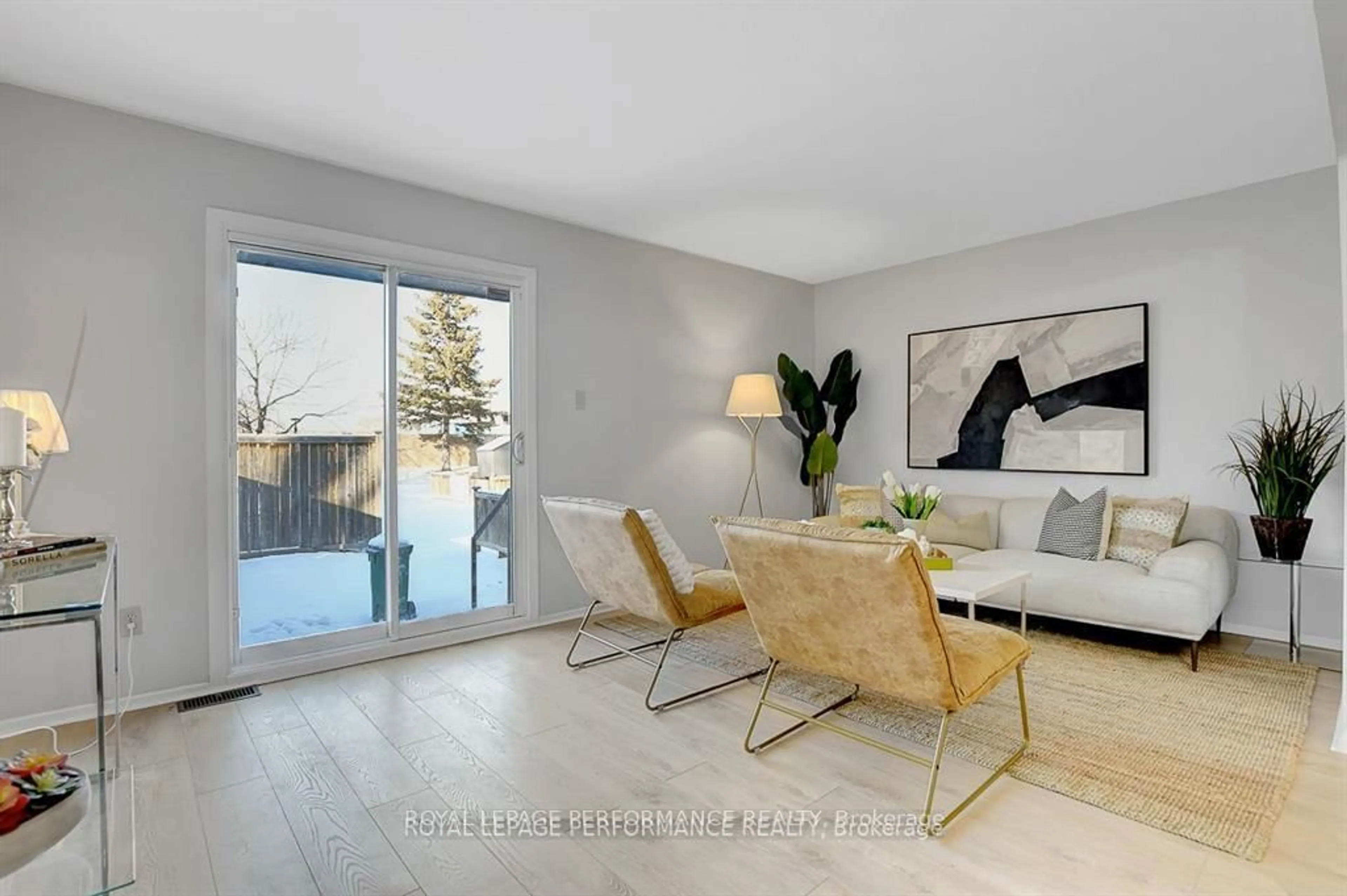 Living room with furniture, wood/laminate floor for 2603 PIMLICO Cres, Ottawa Ontario K1T 2A6