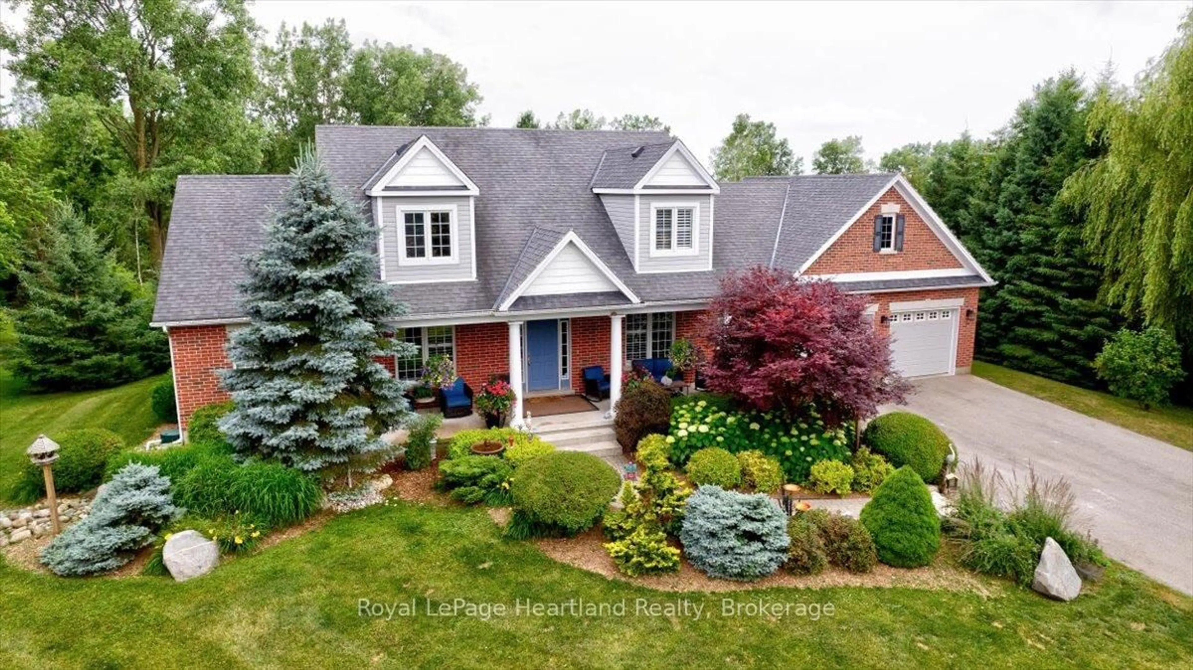 A pic from outside/outdoor area/front of a property/back of a property/a pic from drone, street for 36241 GORE Rd, South Huron Ontario N0M 1T0