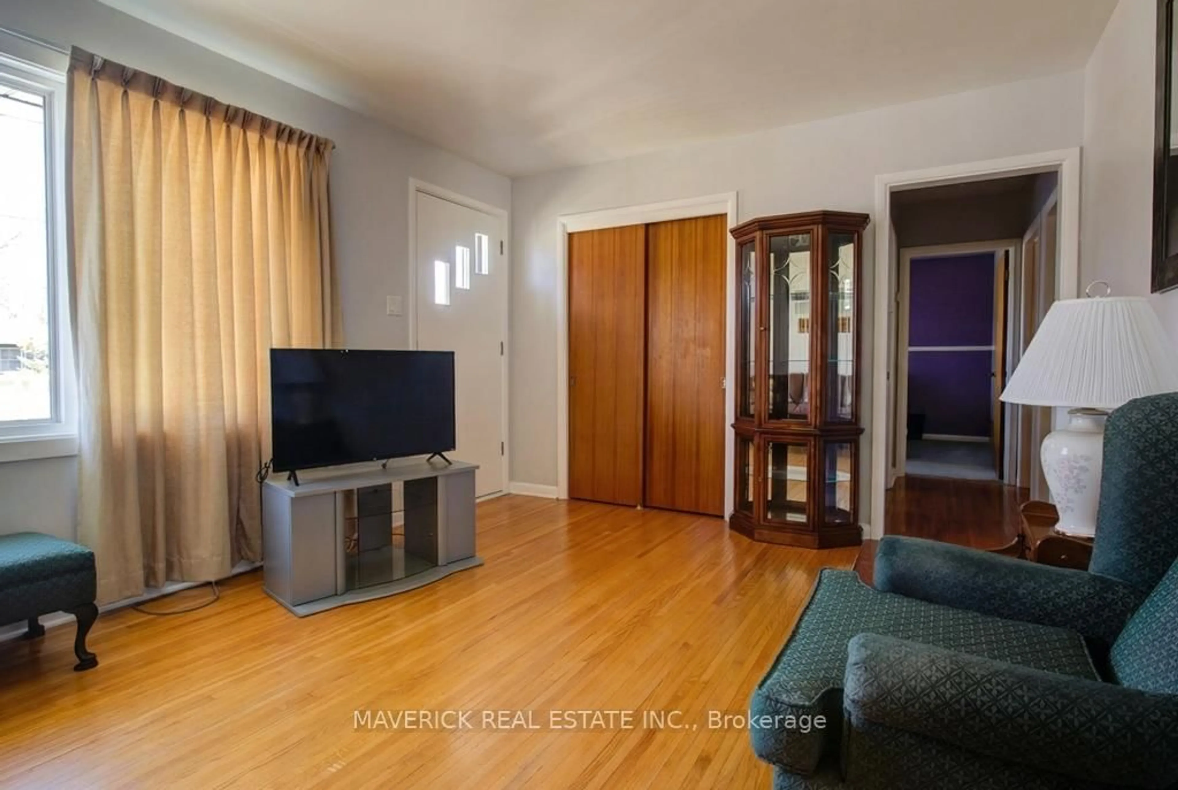 Living room with furniture, wood/laminate floor for 169 Byron St, Zorra Ontario N0M 2M0