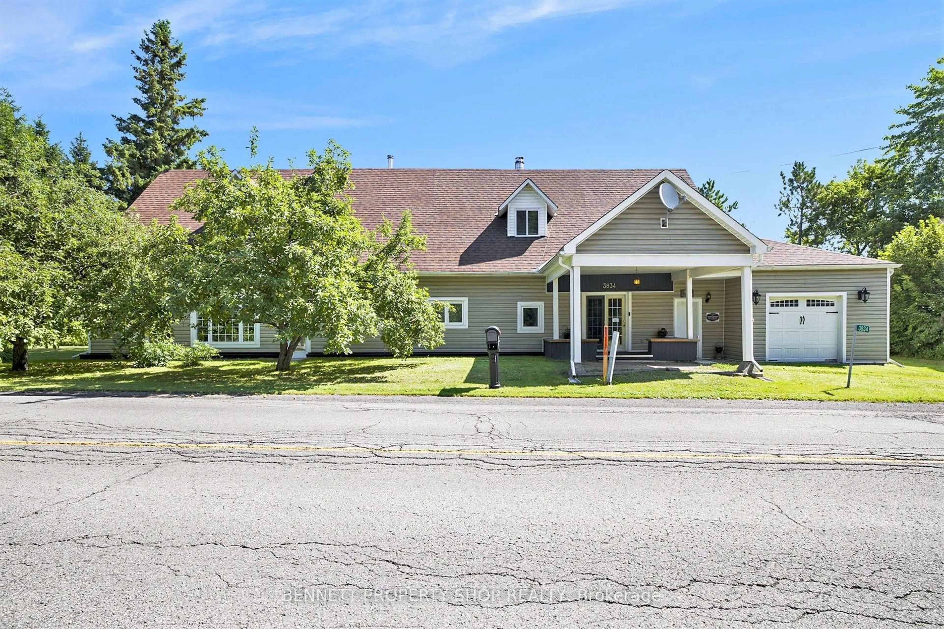 Home with vinyl exterior material, street for 3834 Woodkilton Rd, Casselman Ontario K0A 1M0