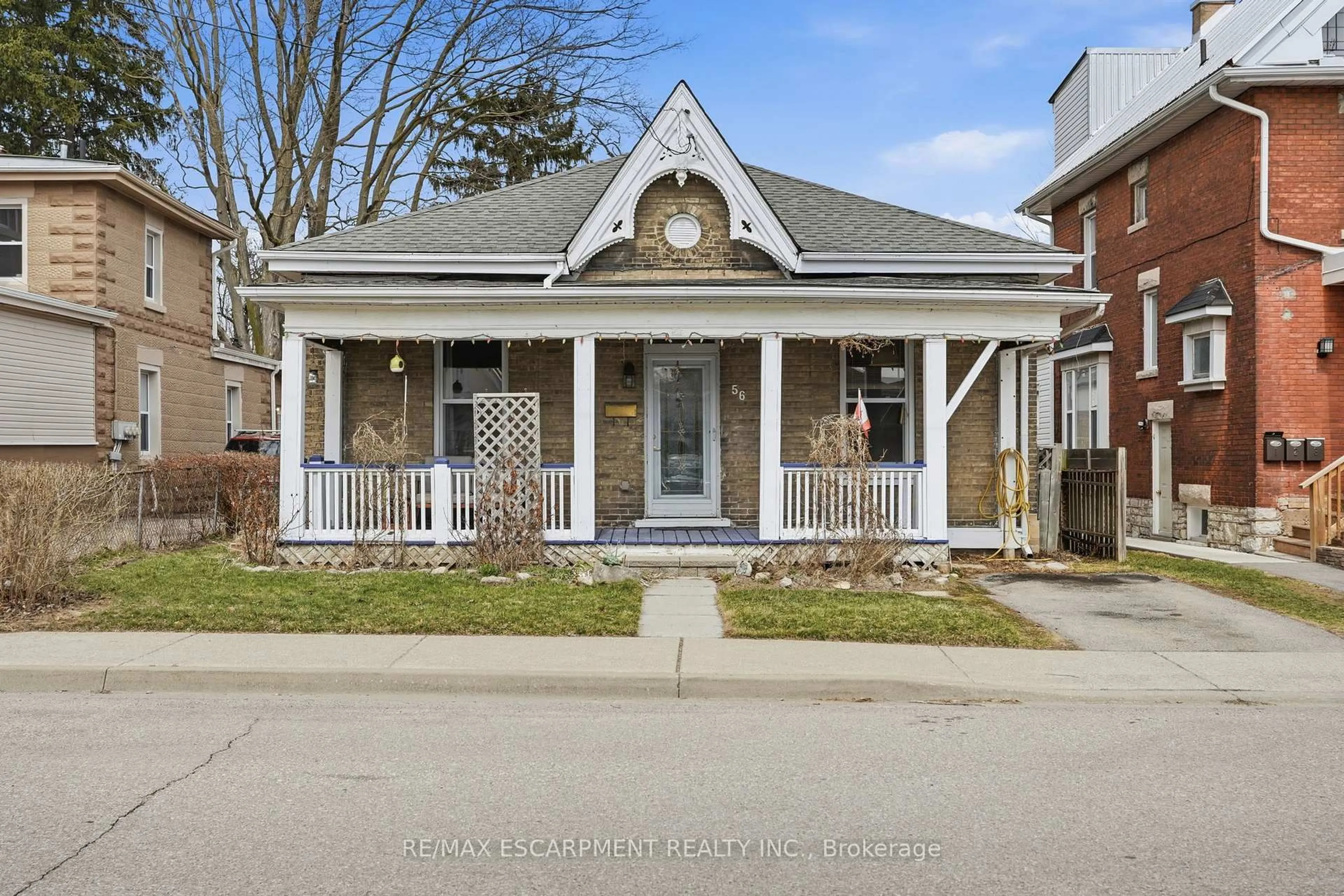 Home with brick exterior material, street for 56 Victoria St, Brantford Ontario N3S 3K2