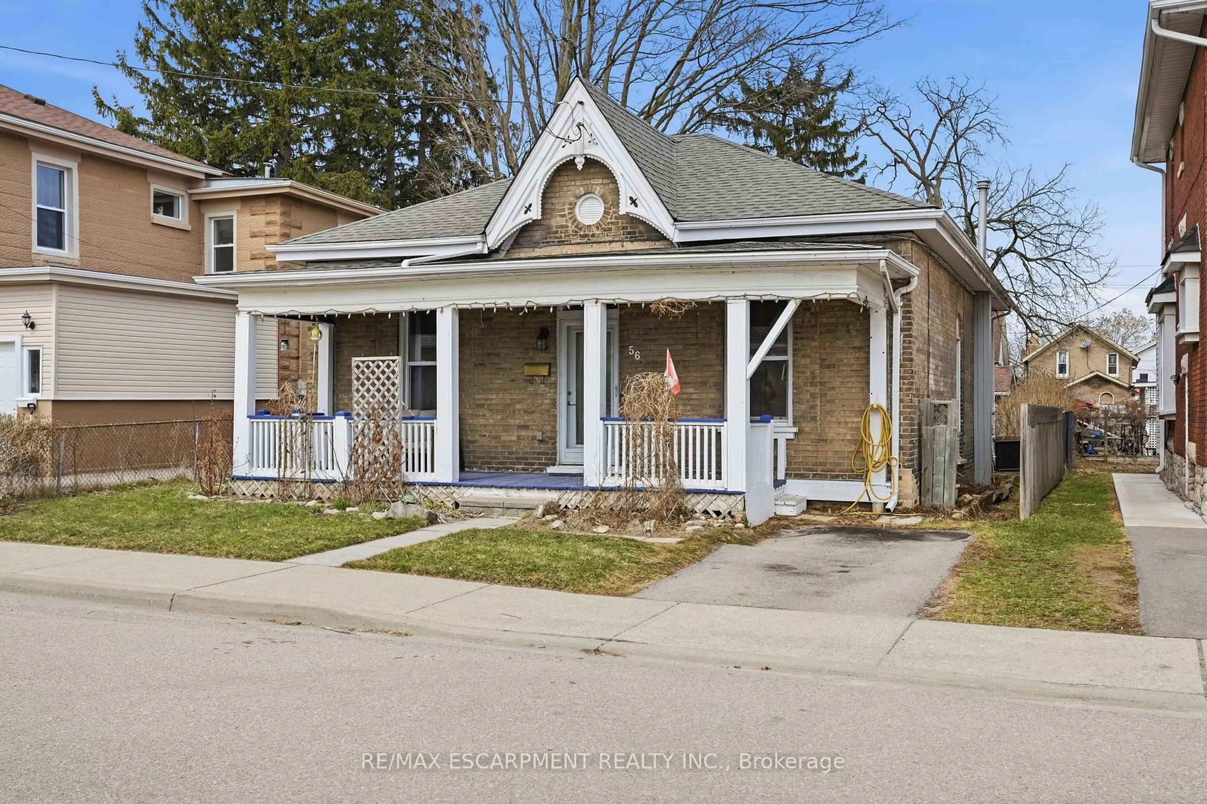 Home with brick exterior material, street for 56 Victoria St, Brantford Ontario N3S 3K2