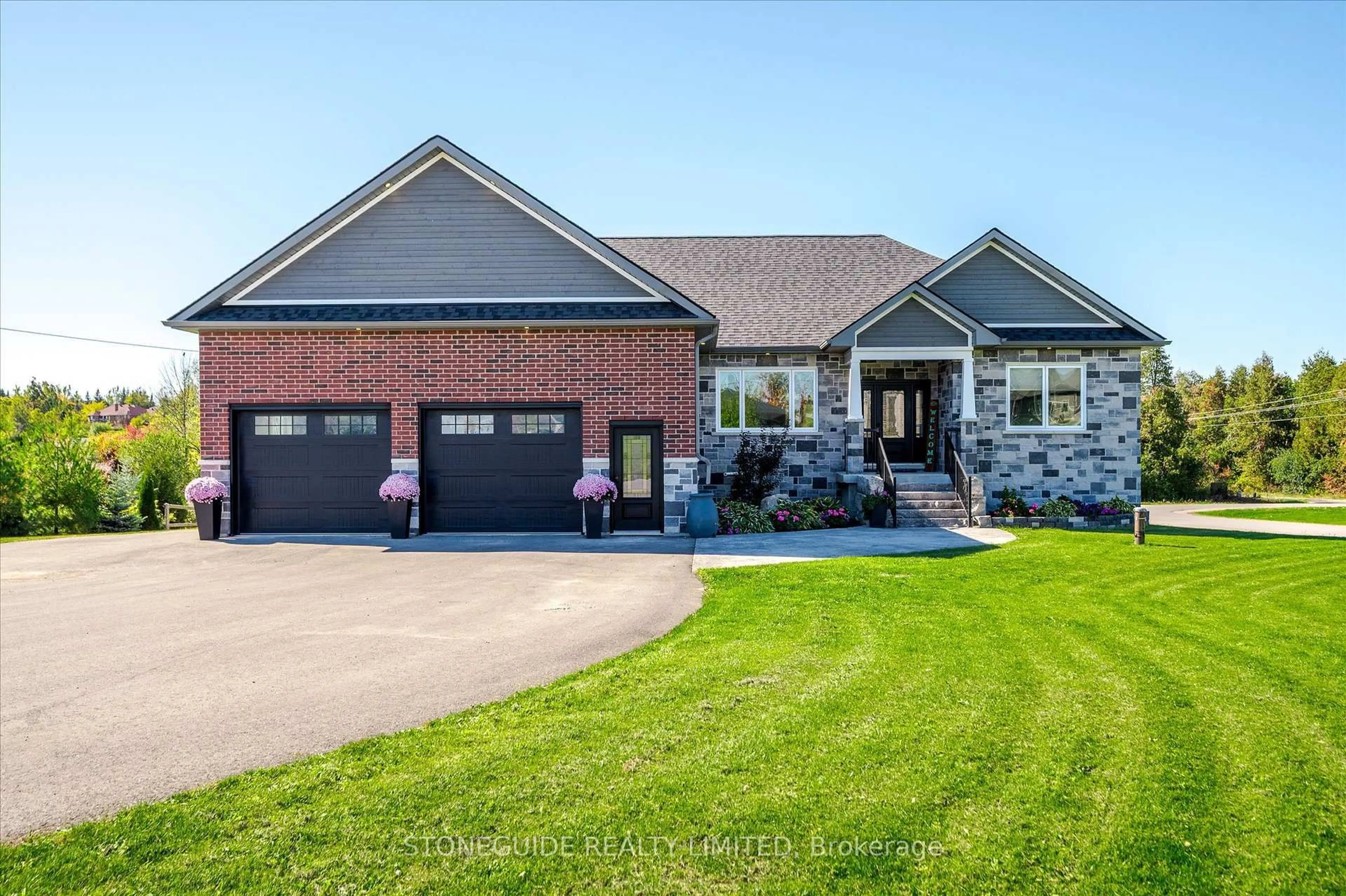 Home with brick exterior material, street for 105 Arnott Dr, Selwyn Ontario K0L 1T0