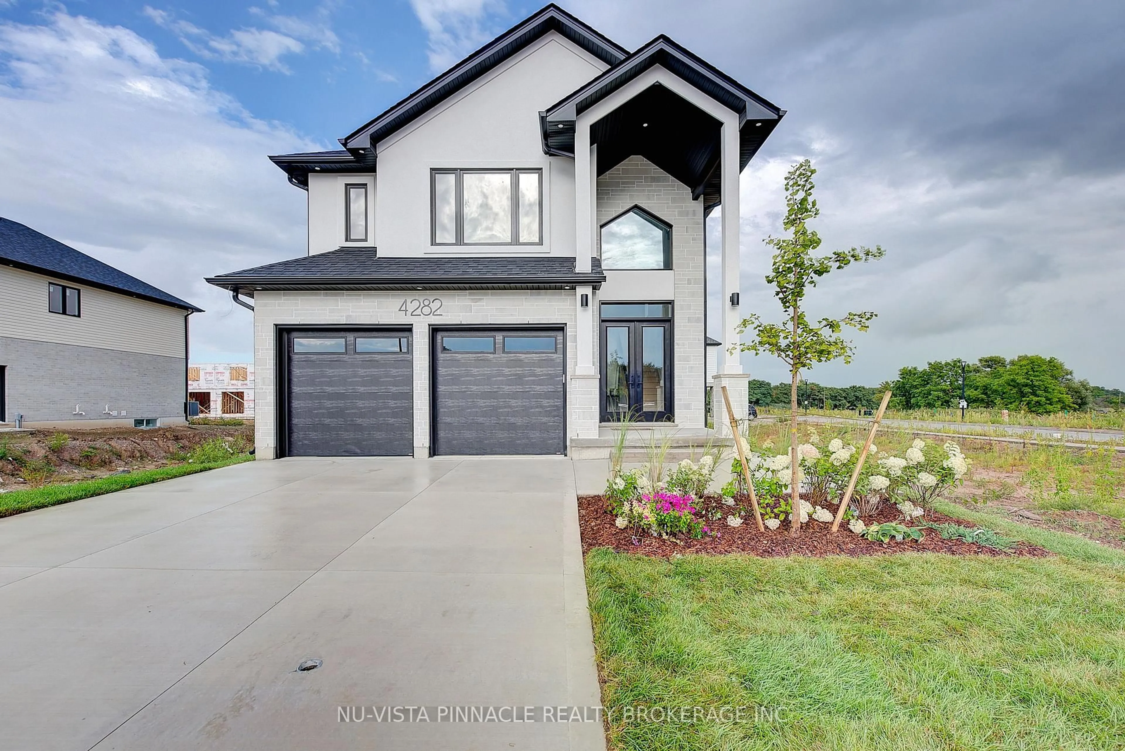 Home with brick exterior material, street for 4248 Liberty Crossing, London South Ontario N6P 1J9