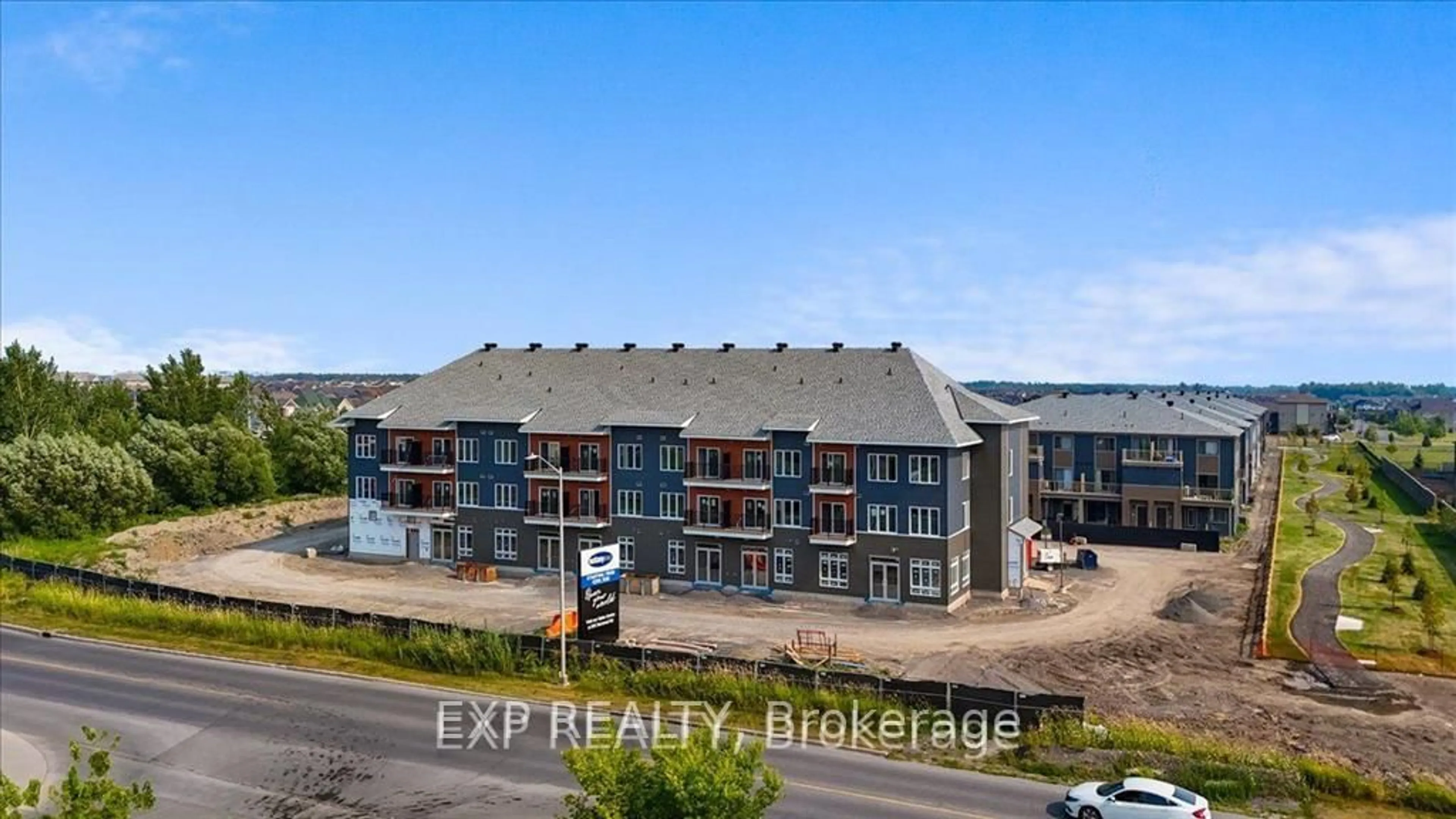 A pic from outside/outdoor area/front of a property/back of a property/a pic from drone, building for 2376 Tenth Line Rd #208, Ottawa Ontario K4A 0M7