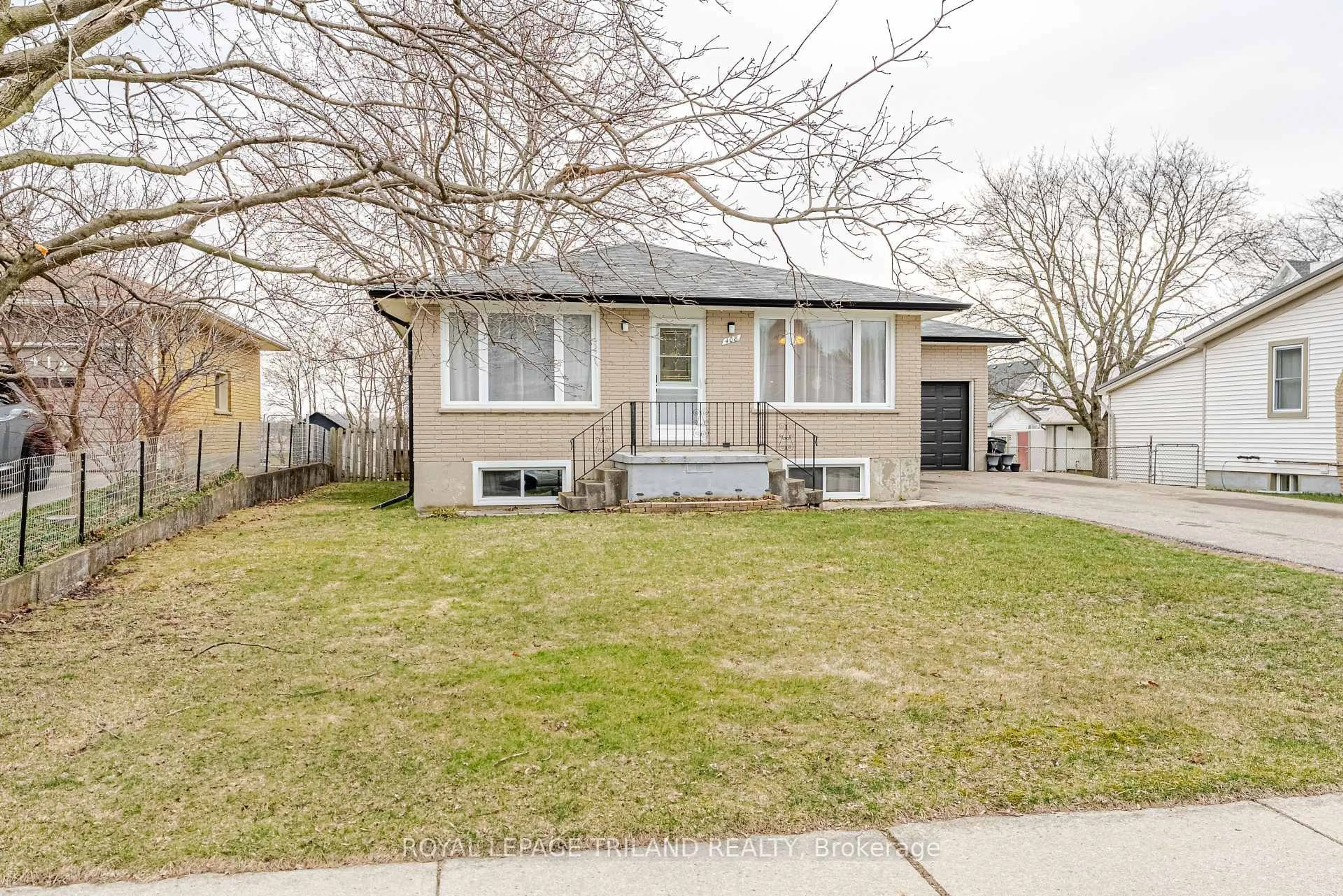 Home with vinyl exterior material, street for 408 John St, Aylmer Ontario N5H 2E4