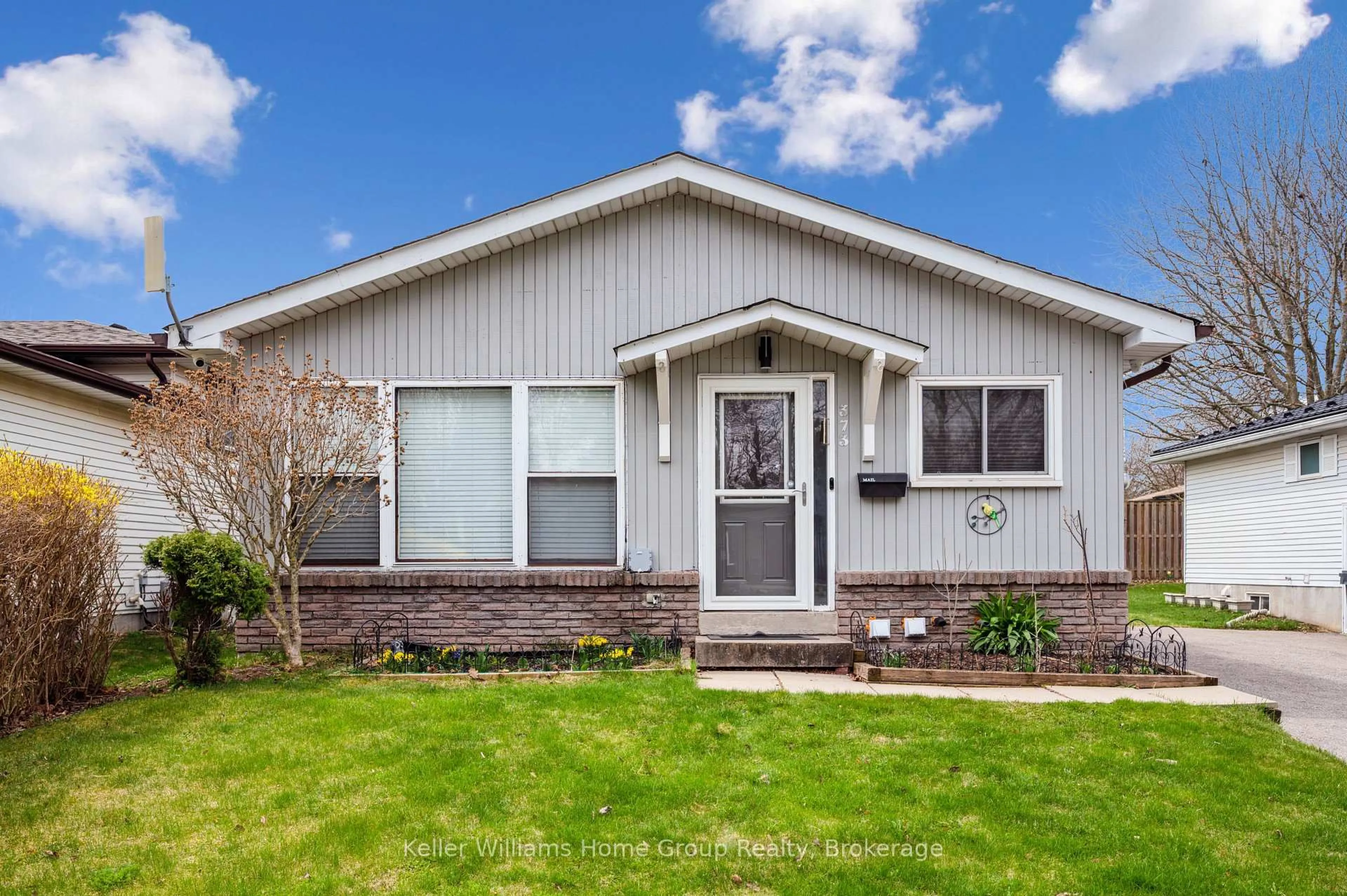 Home with vinyl exterior material, street for 373 West Acres Dr, Guelph Ontario N1H 7B3