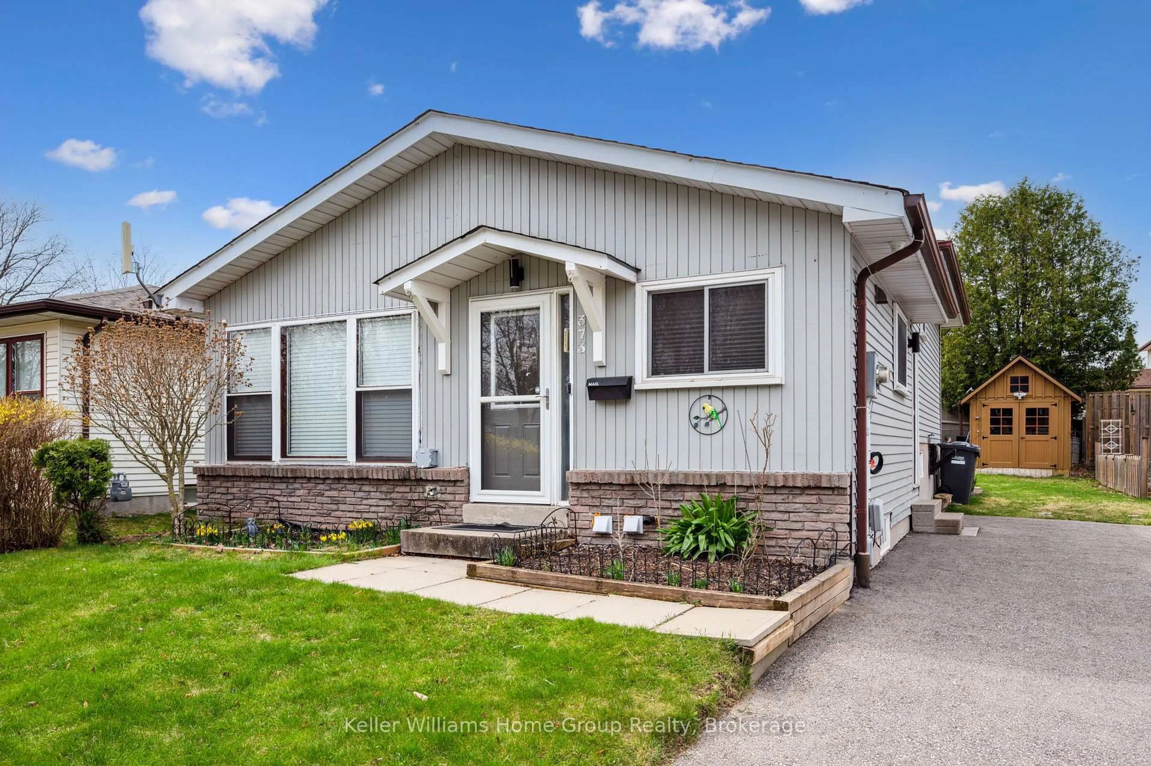 Home with vinyl exterior material, street for 373 West Acres Dr, Guelph Ontario N1H 7B3