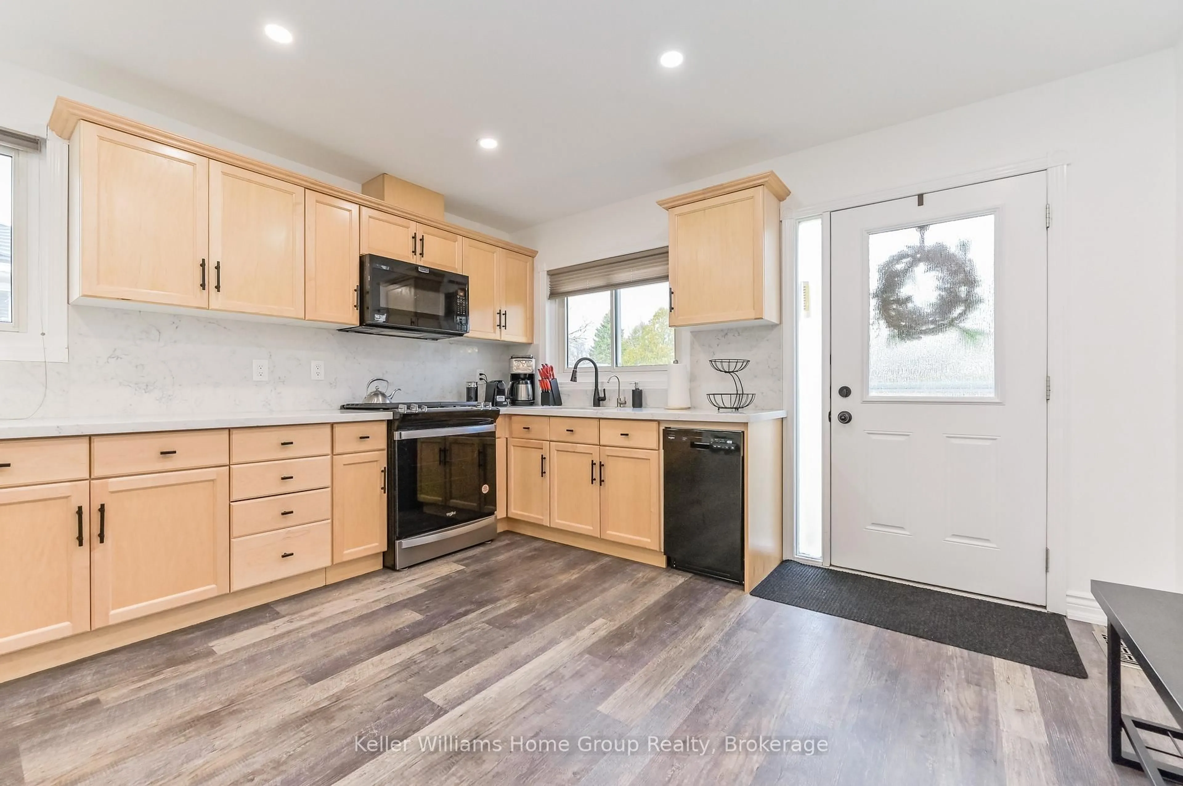 Open concept kitchen, wood/laminate floor for 373 West Acres Dr, Guelph Ontario N1H 7B3