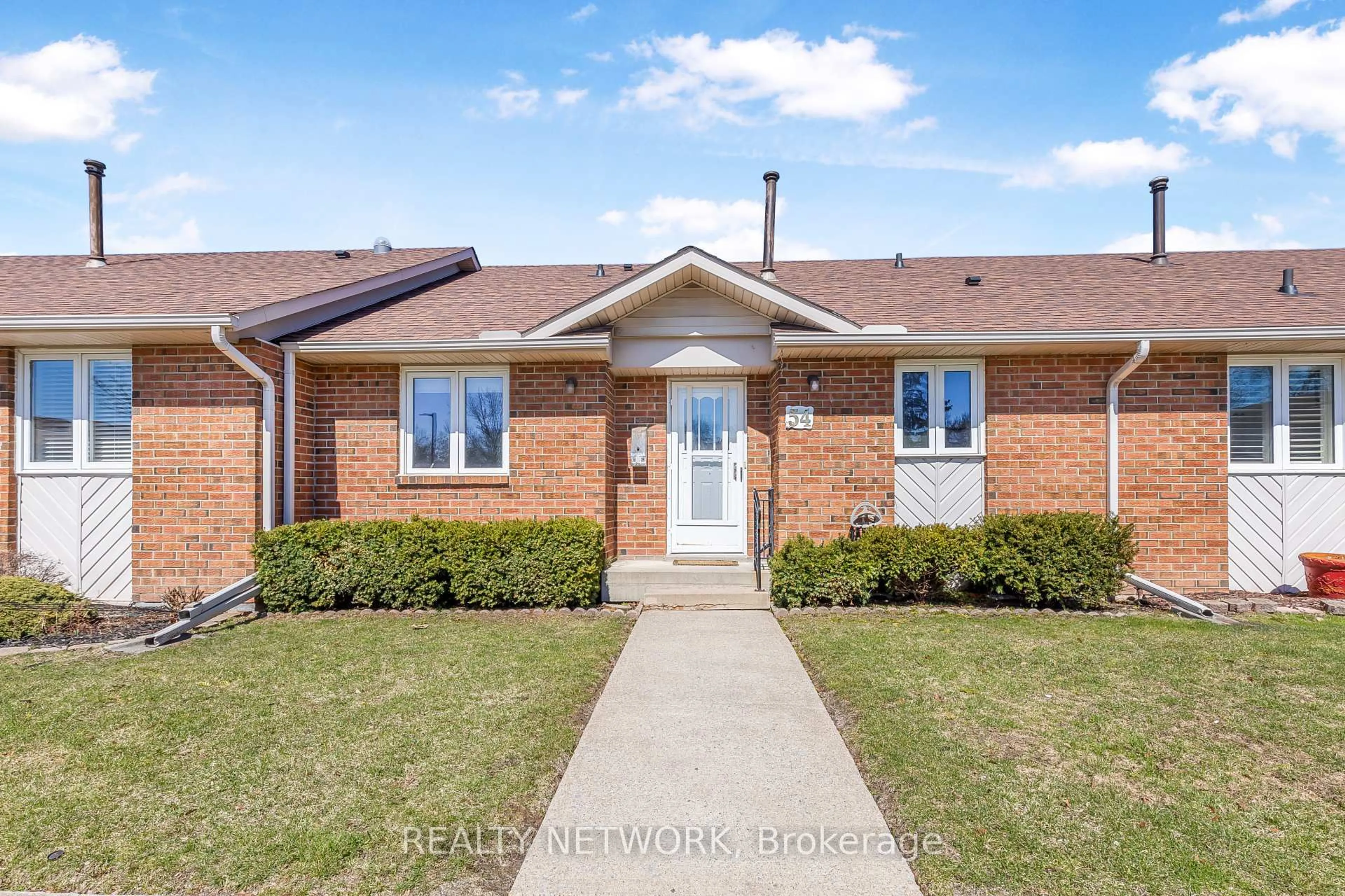 Home with brick exterior material, street for 122 Bunting Rd #54, St. Catharines Ontario L2P 3X7