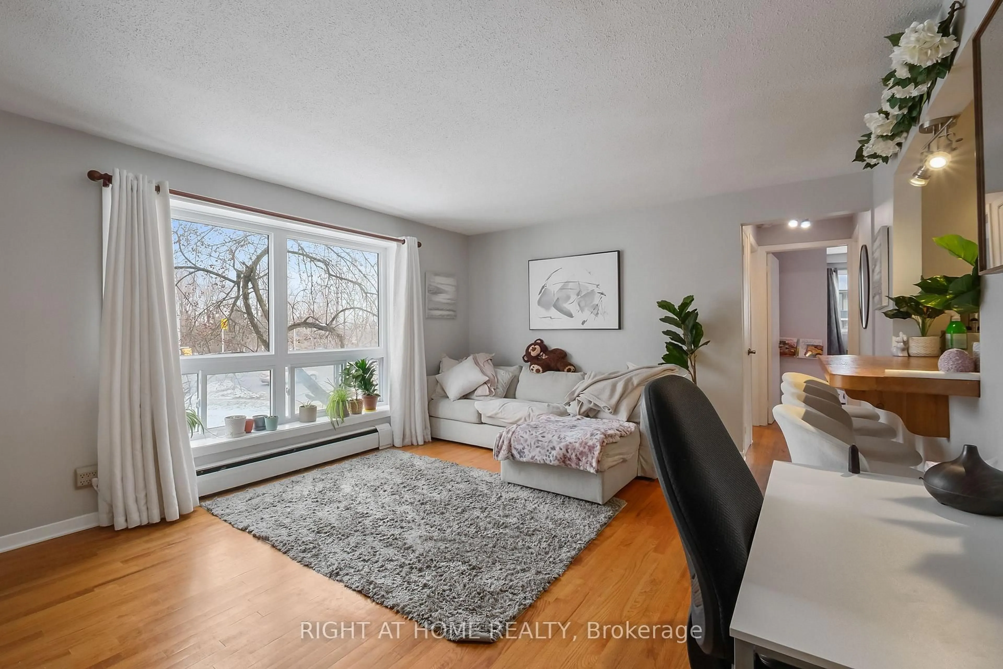 Living room with furniture, unknown for 898 Elmsmere Rd #11, Ottawa Ontario K1J 7T6