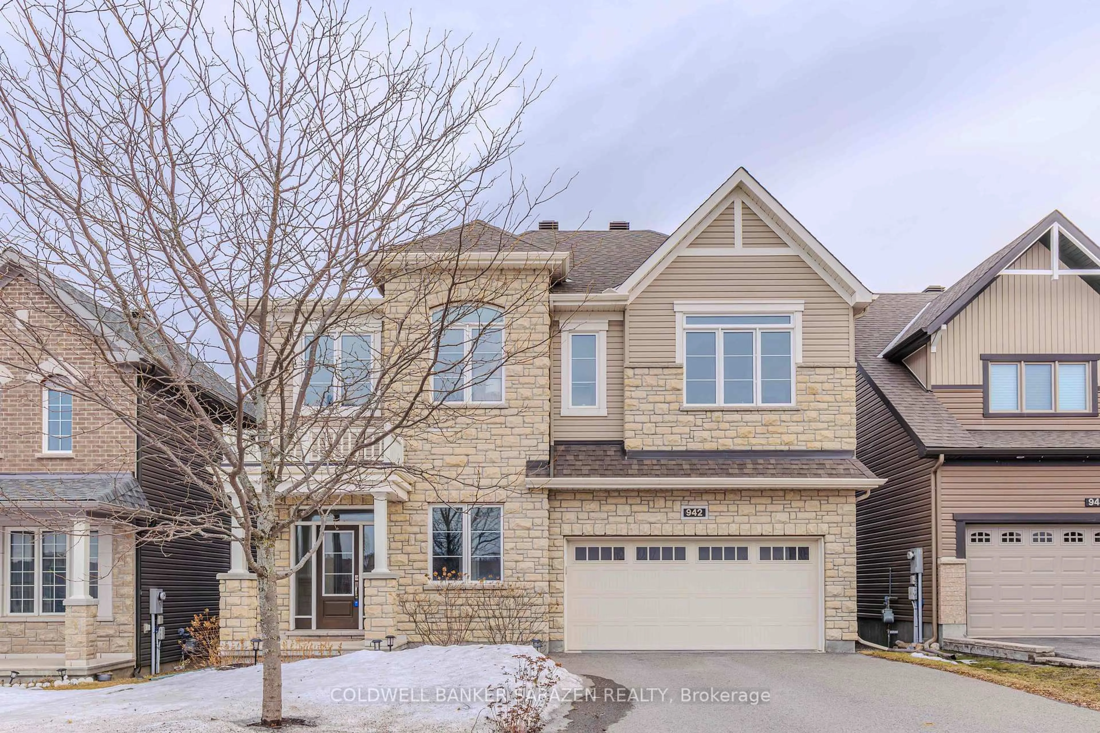 Home with brick exterior material, street for 942 Guinness Cres, Ottawa Ontario K2C 3H2