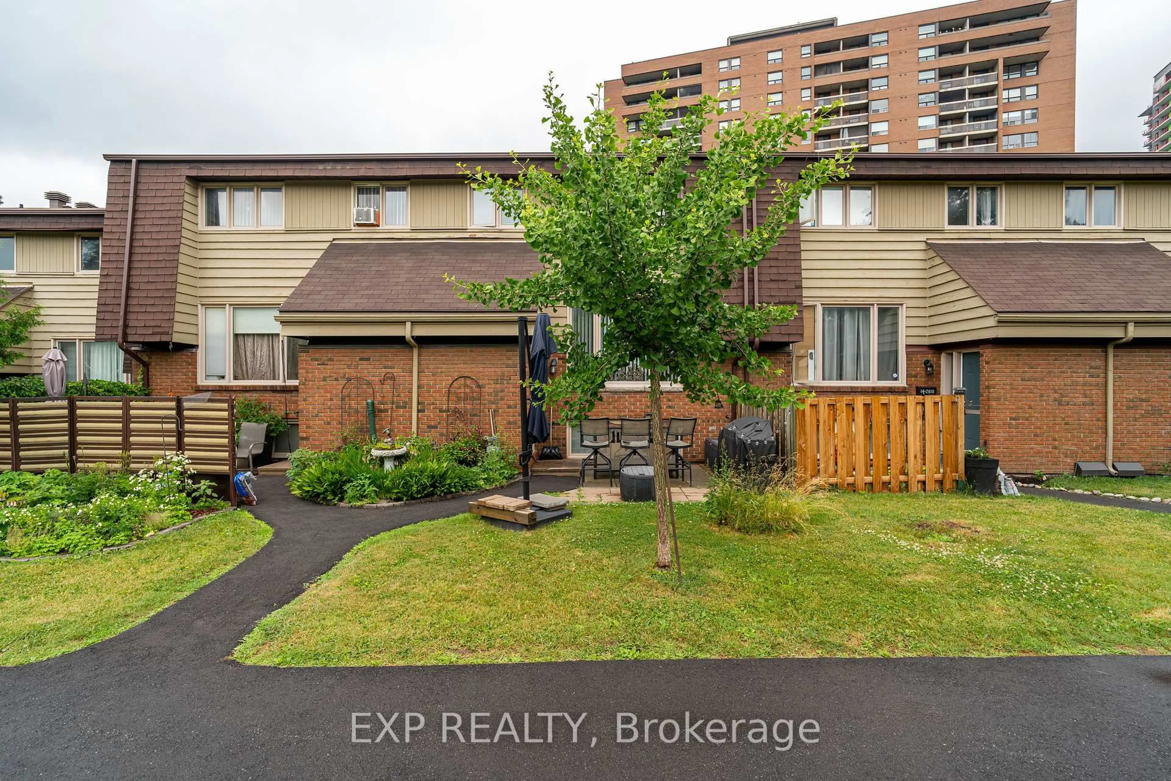 A pic from outside/outdoor area/front of a property/back of a property/a pic from drone, street for 2610 Draper Ave #12, Ottawa Ontario K2H 8X8