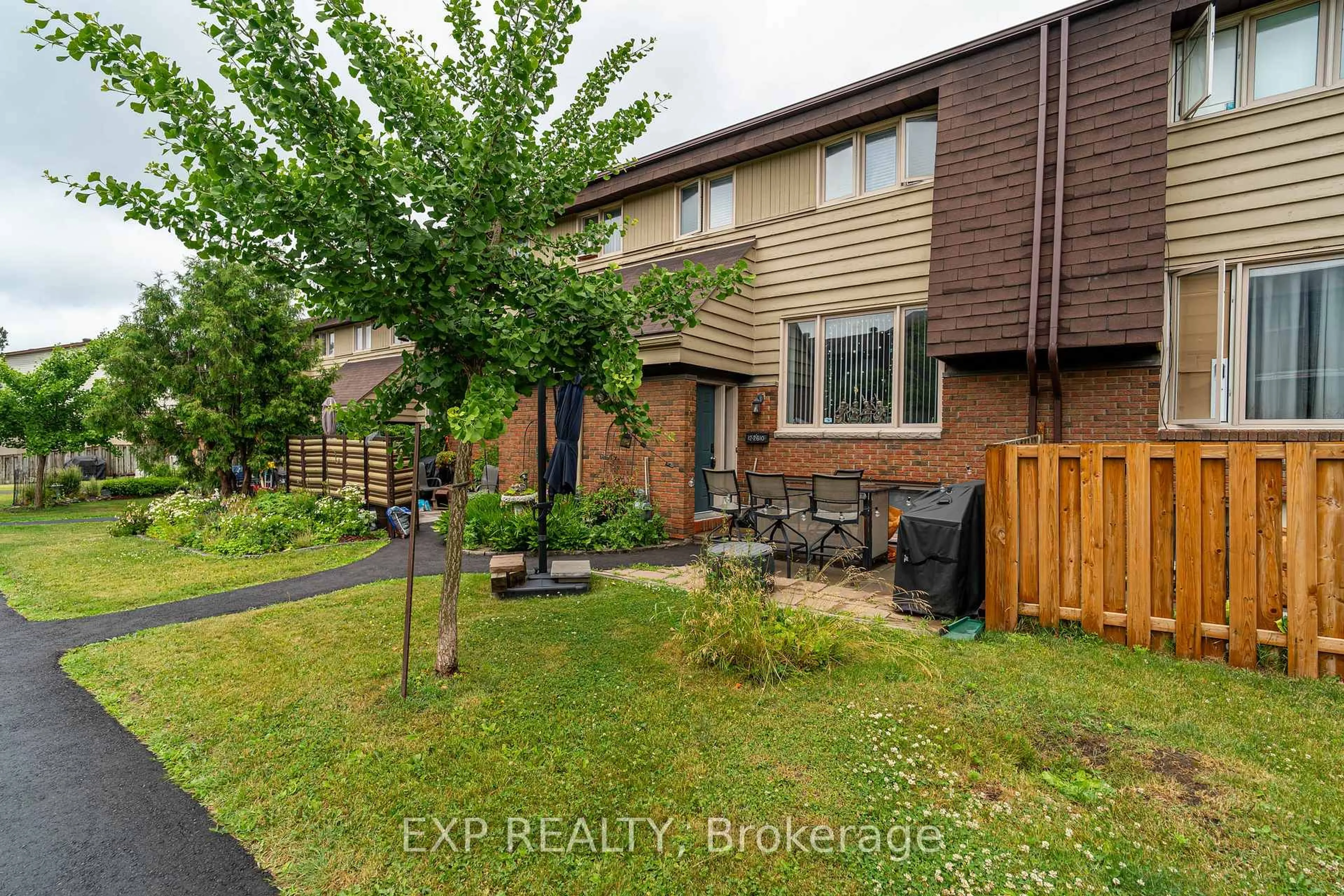 A pic from outside/outdoor area/front of a property/back of a property/a pic from drone, street for 2610 Draper Ave #12, Ottawa Ontario K2H 8X8