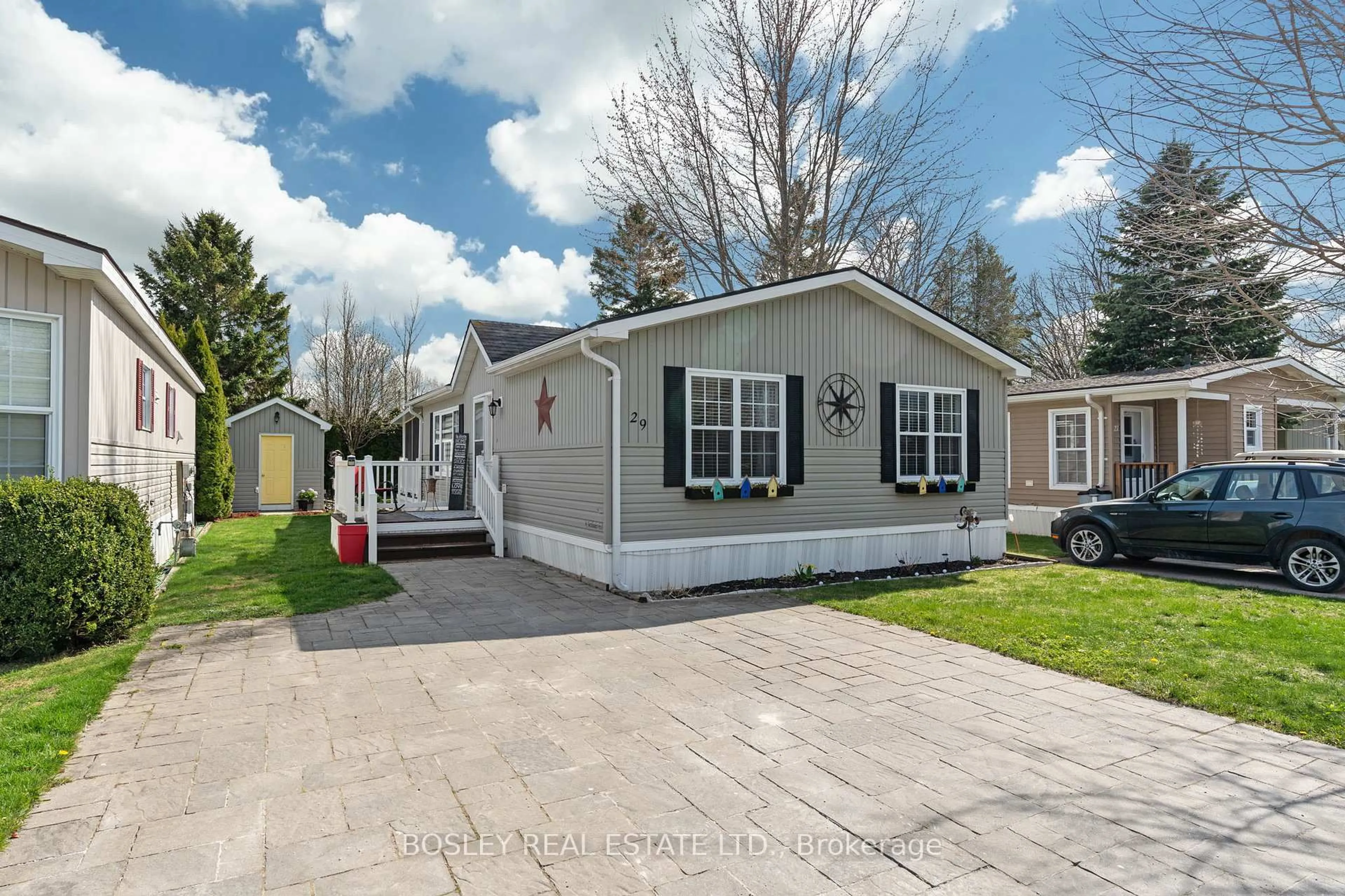 Home with vinyl exterior material, street for 77307 Bluewater Highway #29 Rowan Rd, Bluewater Ontario N0M 1G0