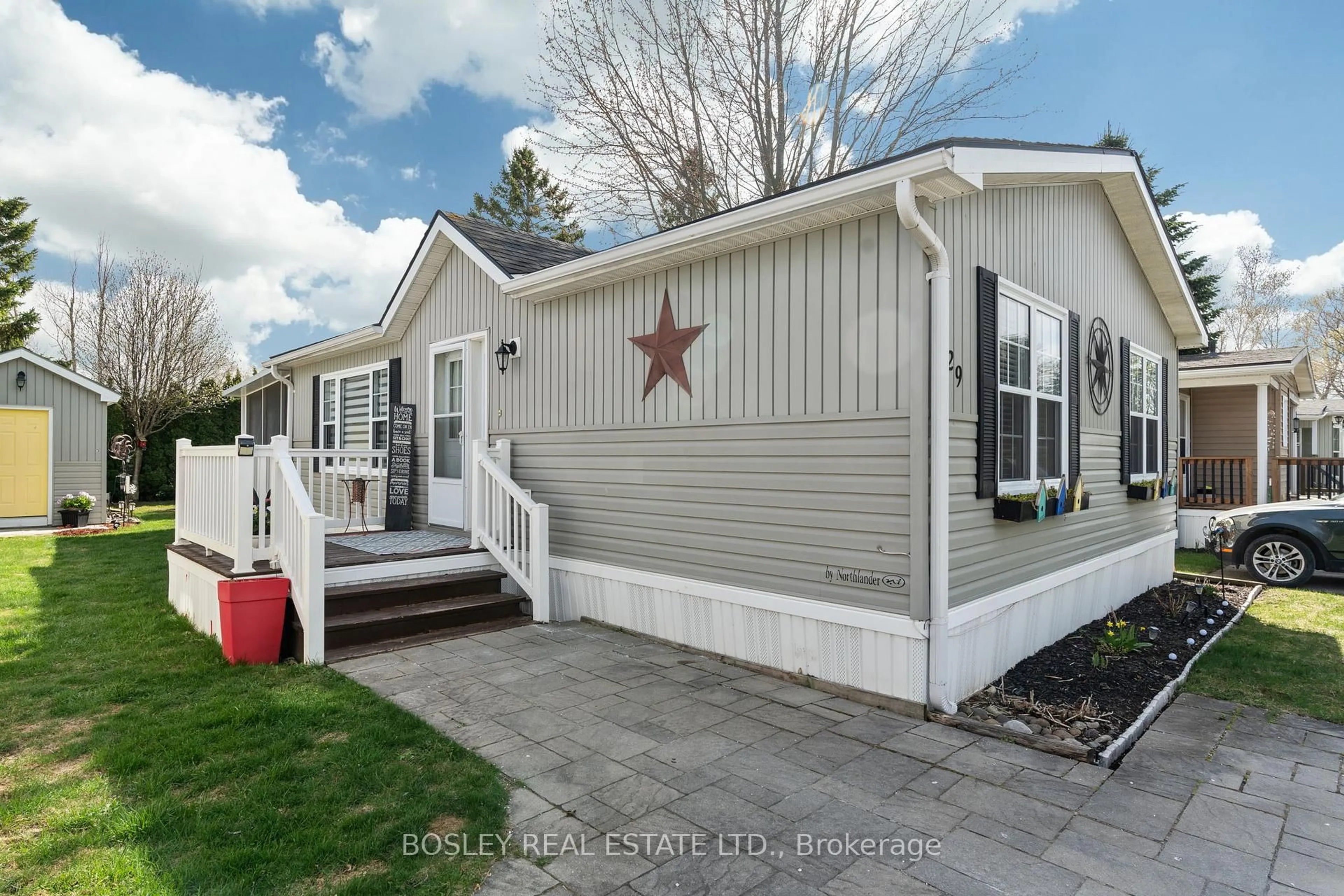 Home with vinyl exterior material, street for 77307 Bluewater Highway #29 Rowan Rd, Bluewater Ontario N0M 1G0