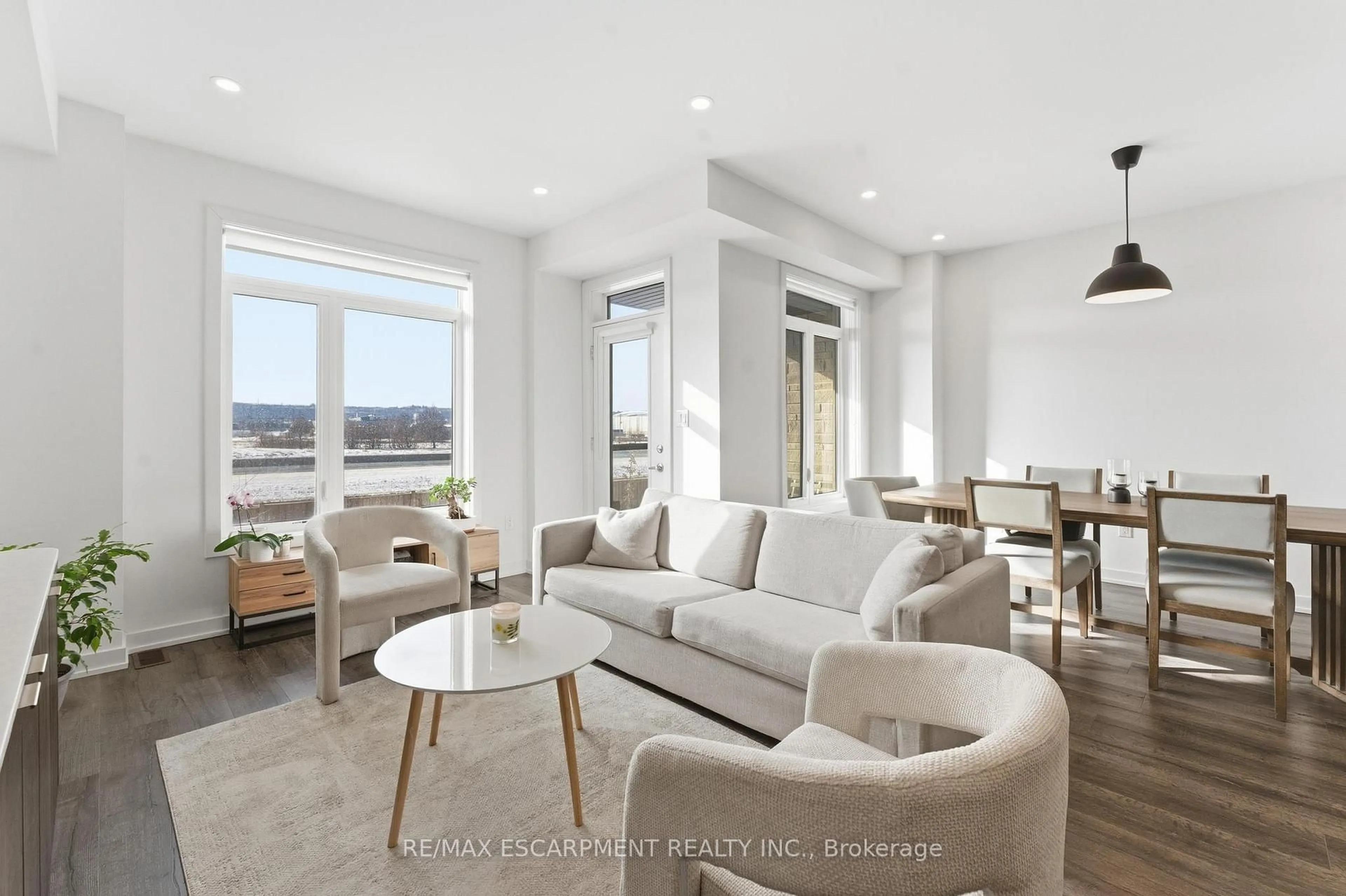 Living room with furniture, unknown for 590 North Service Rd #44, Hamilton Ontario L8E 0K5