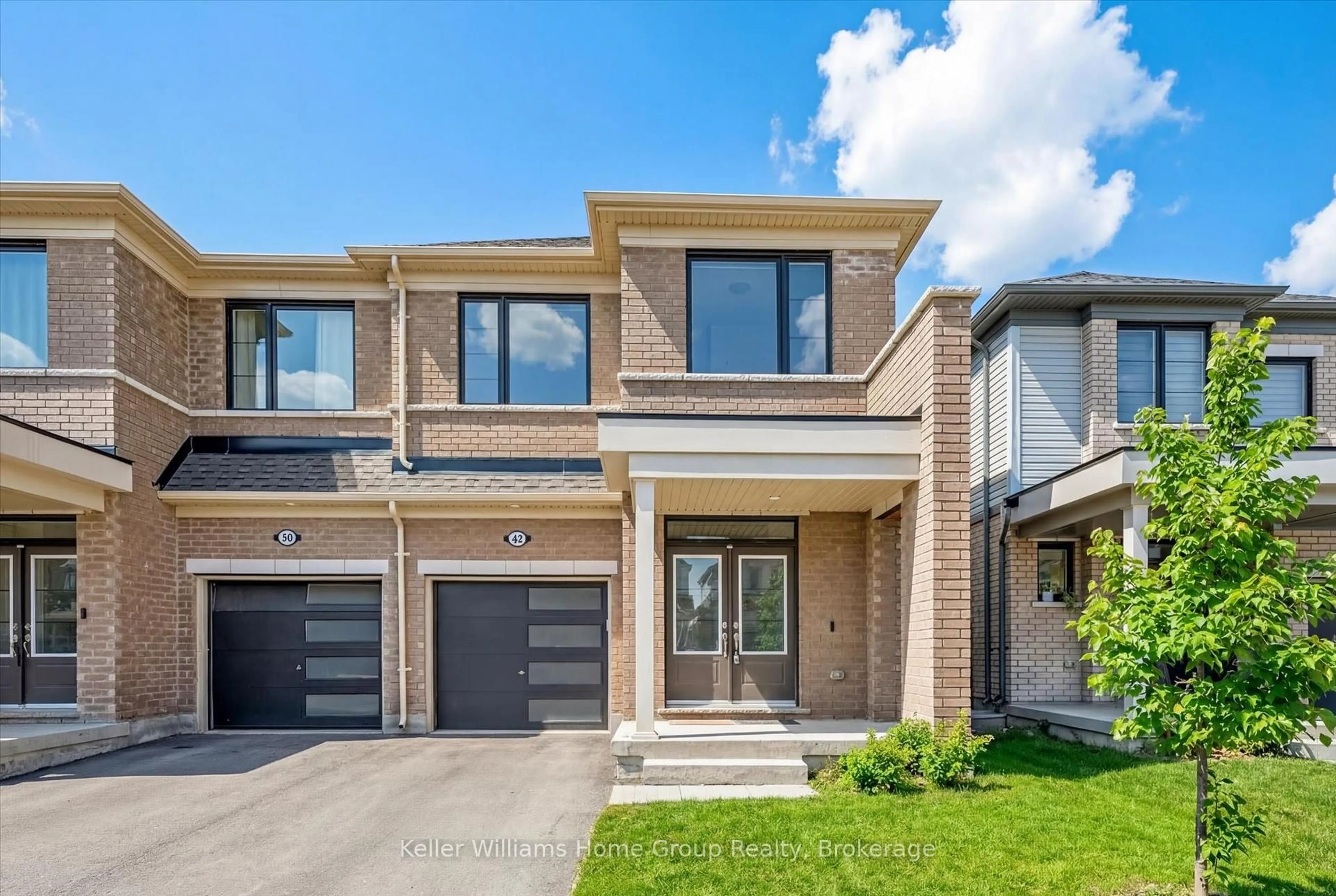 Home with brick exterior material, street for 42 Povey Rd, Centre Wellington Ontario N1M 0J5